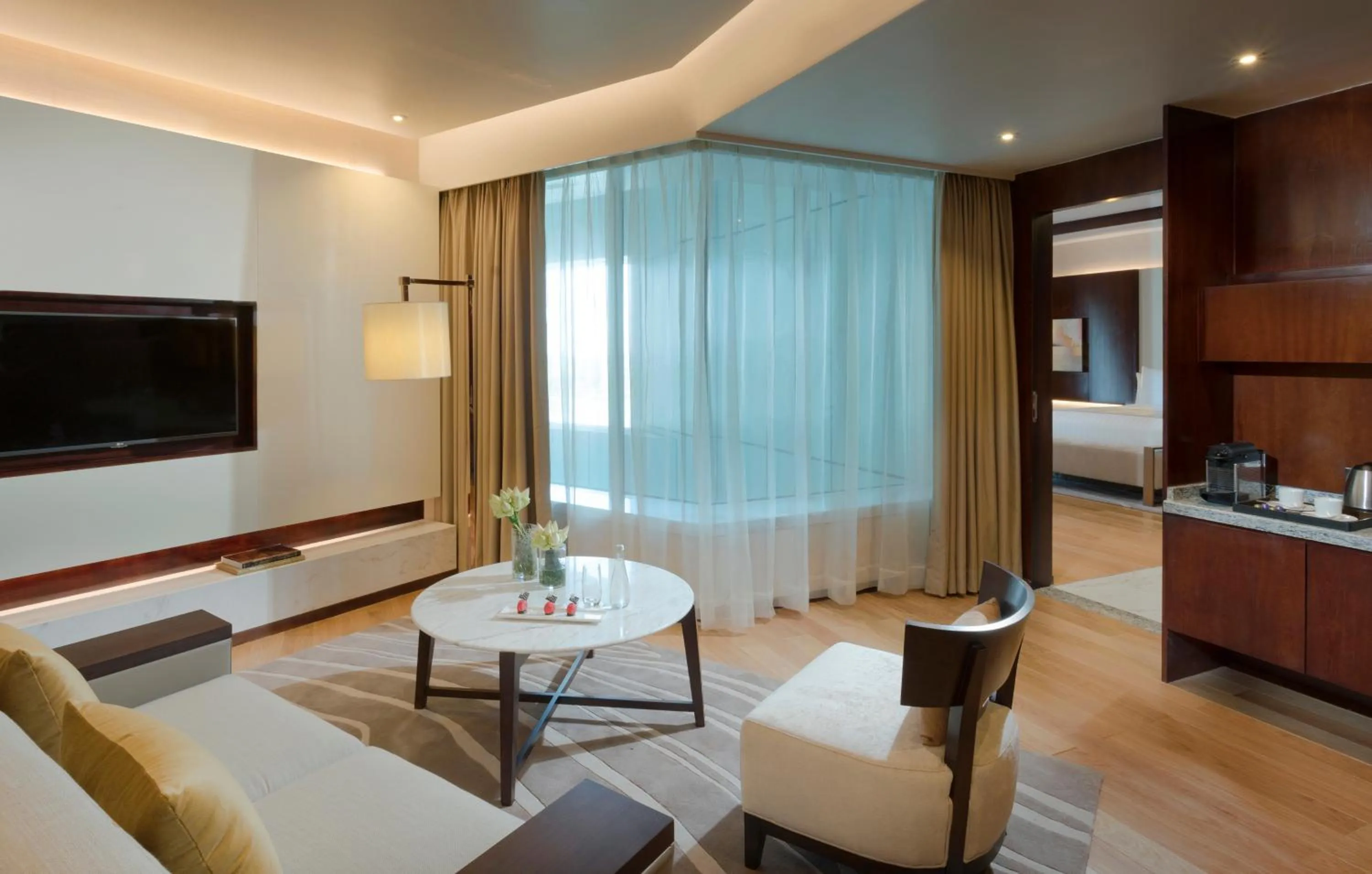 Living room, Bed in Melia Yangon