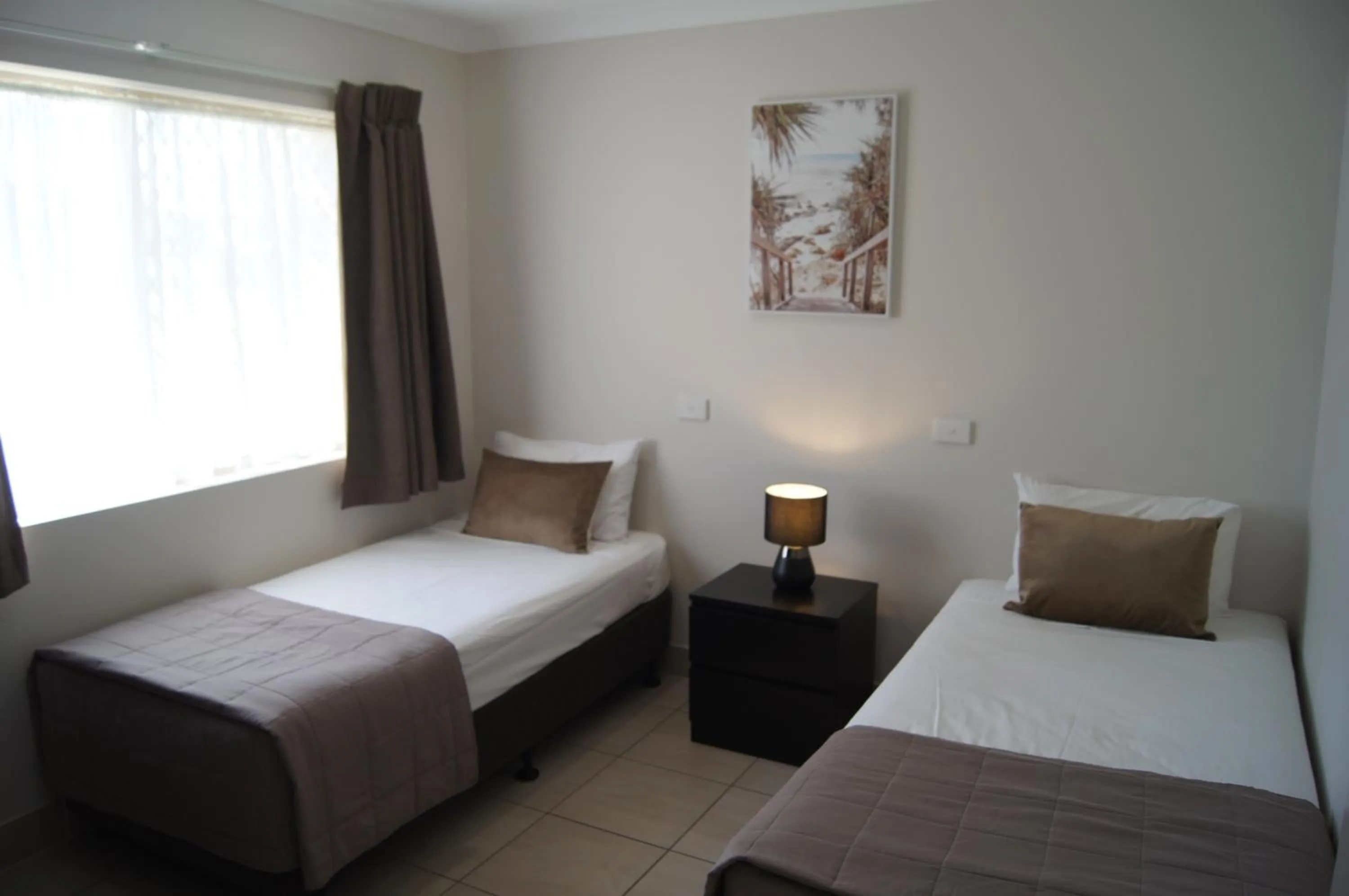 Bed in Beachside Motor Inn By Golden Chain