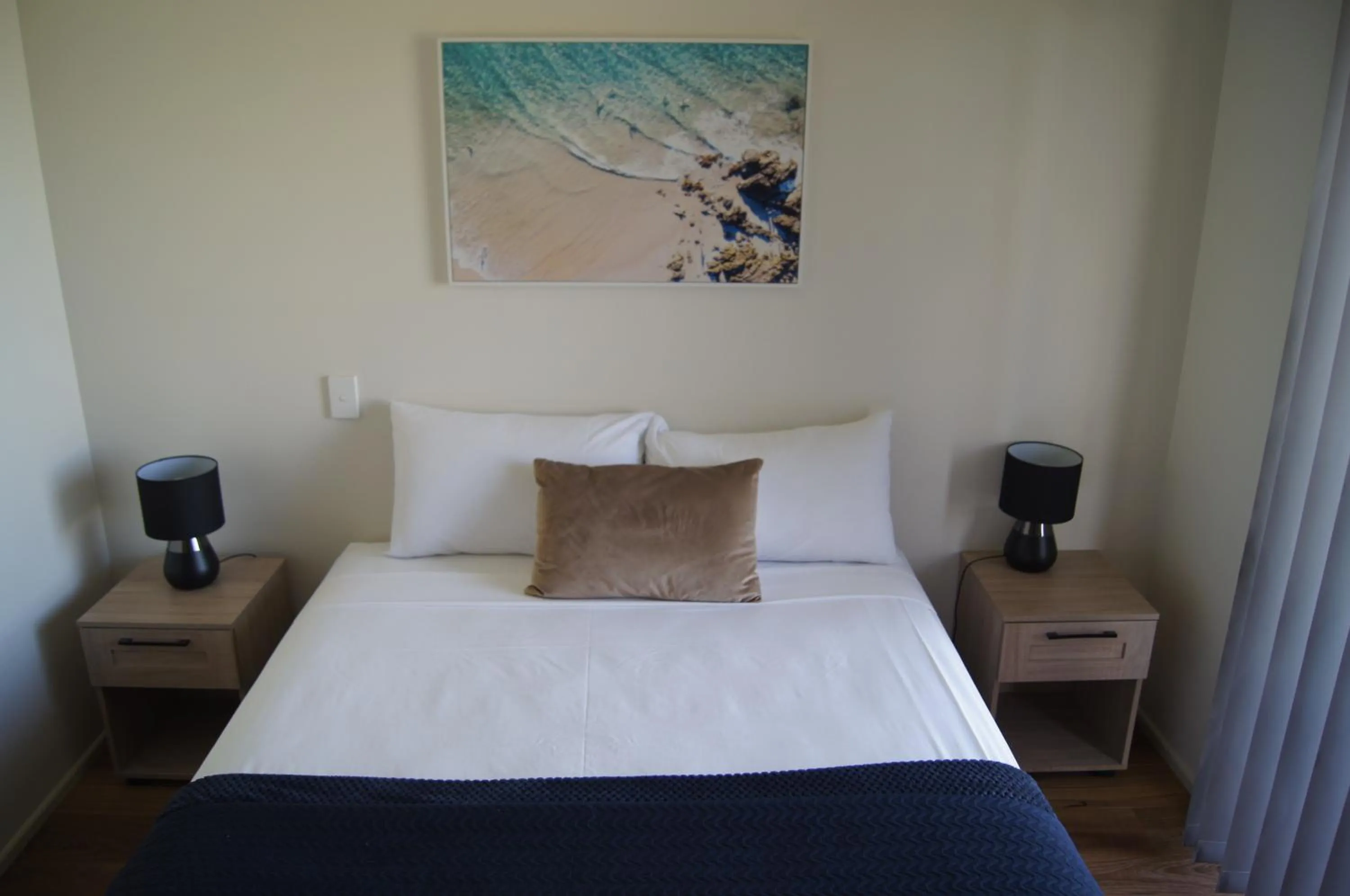 Bed in Beachside Motor Inn By Golden Chain