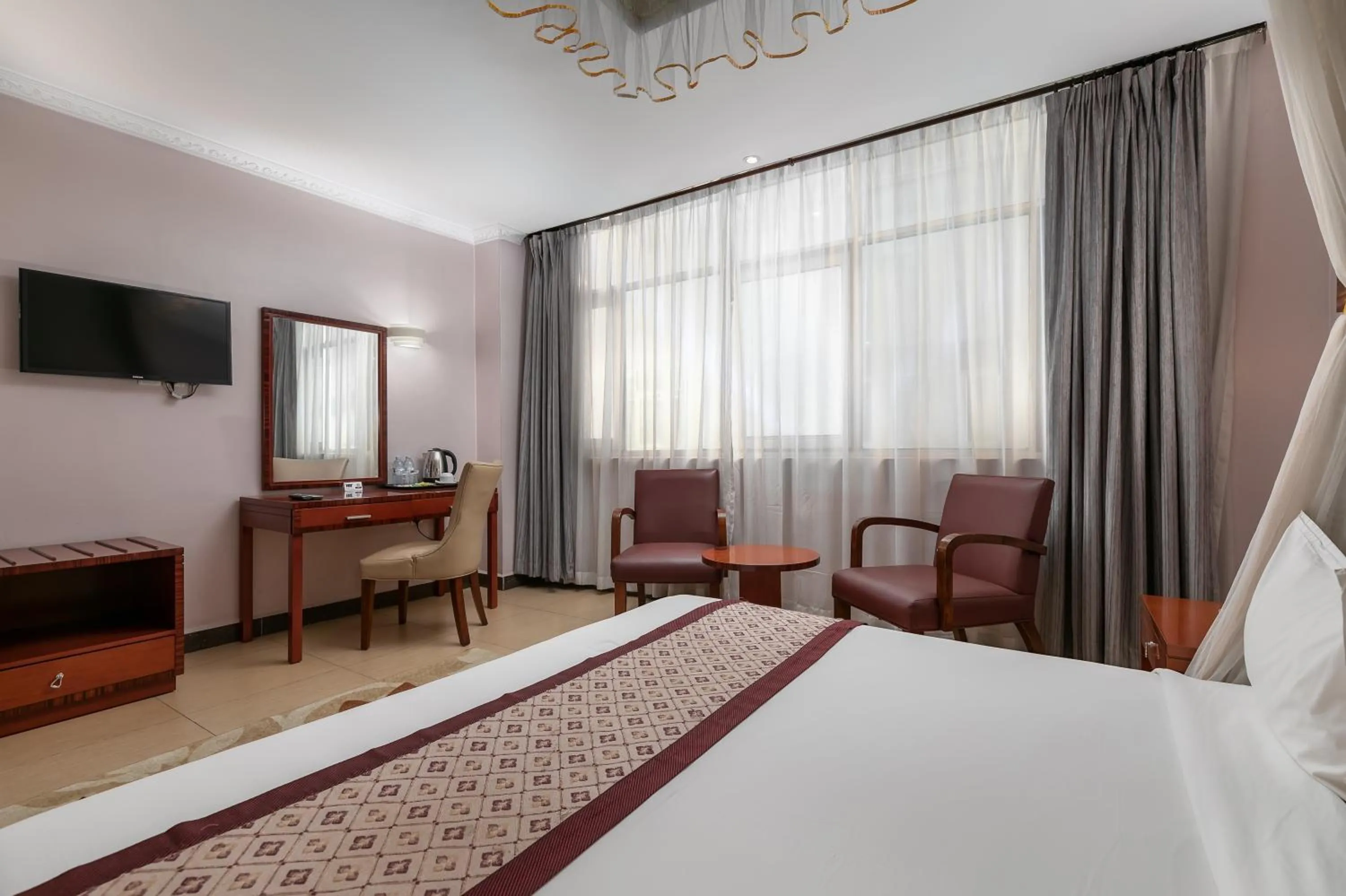 Bed in Russell Hotel