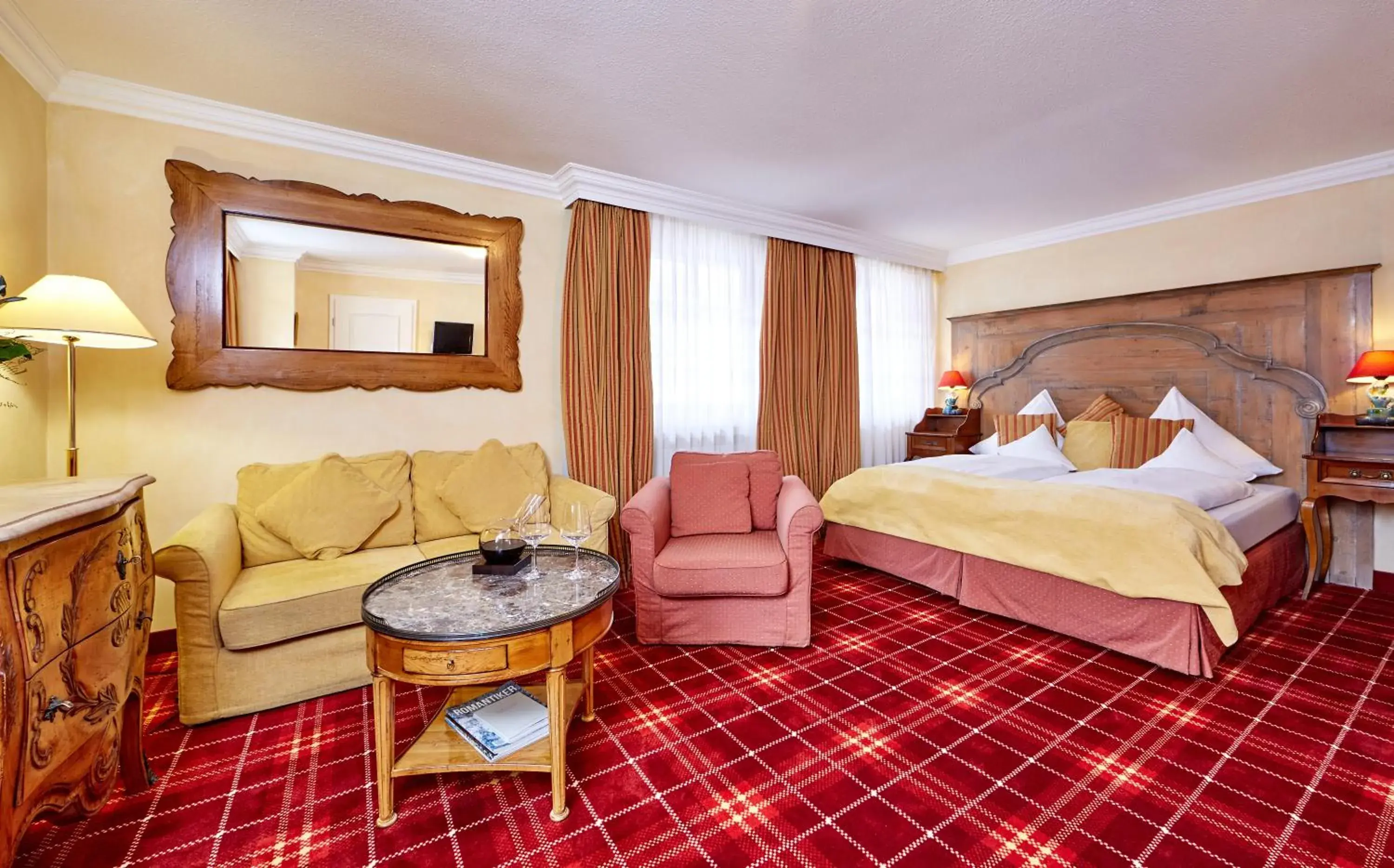 Photo of the whole room, Bed in Romantik Alpenhotel Waxenstein Photo of the whole room, Bed in Romantik Alpenhotel Waxenstein