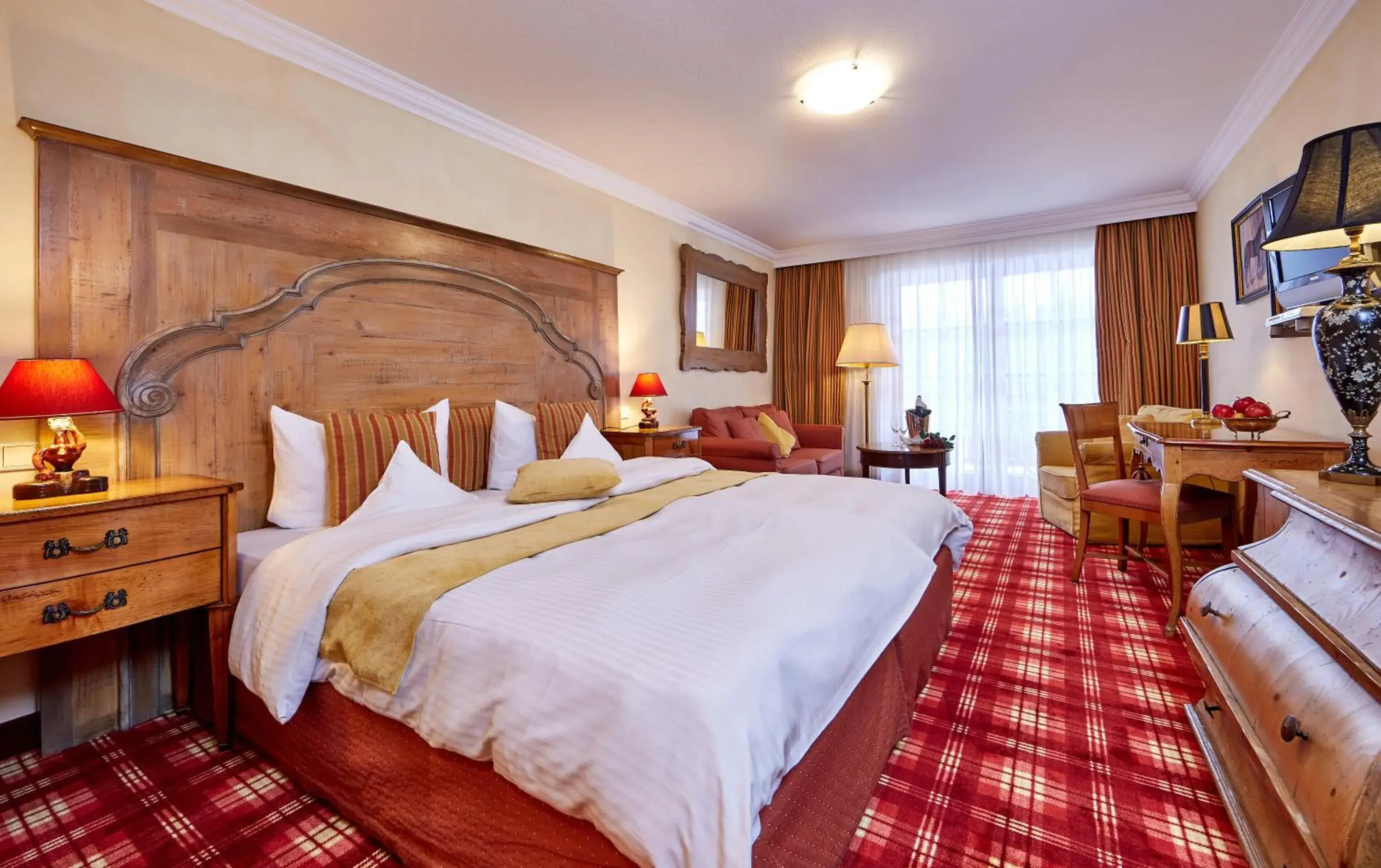 Bed in Romantik Alpenhotel Waxenstein Bed in Romantik Alpenhotel Waxenstein