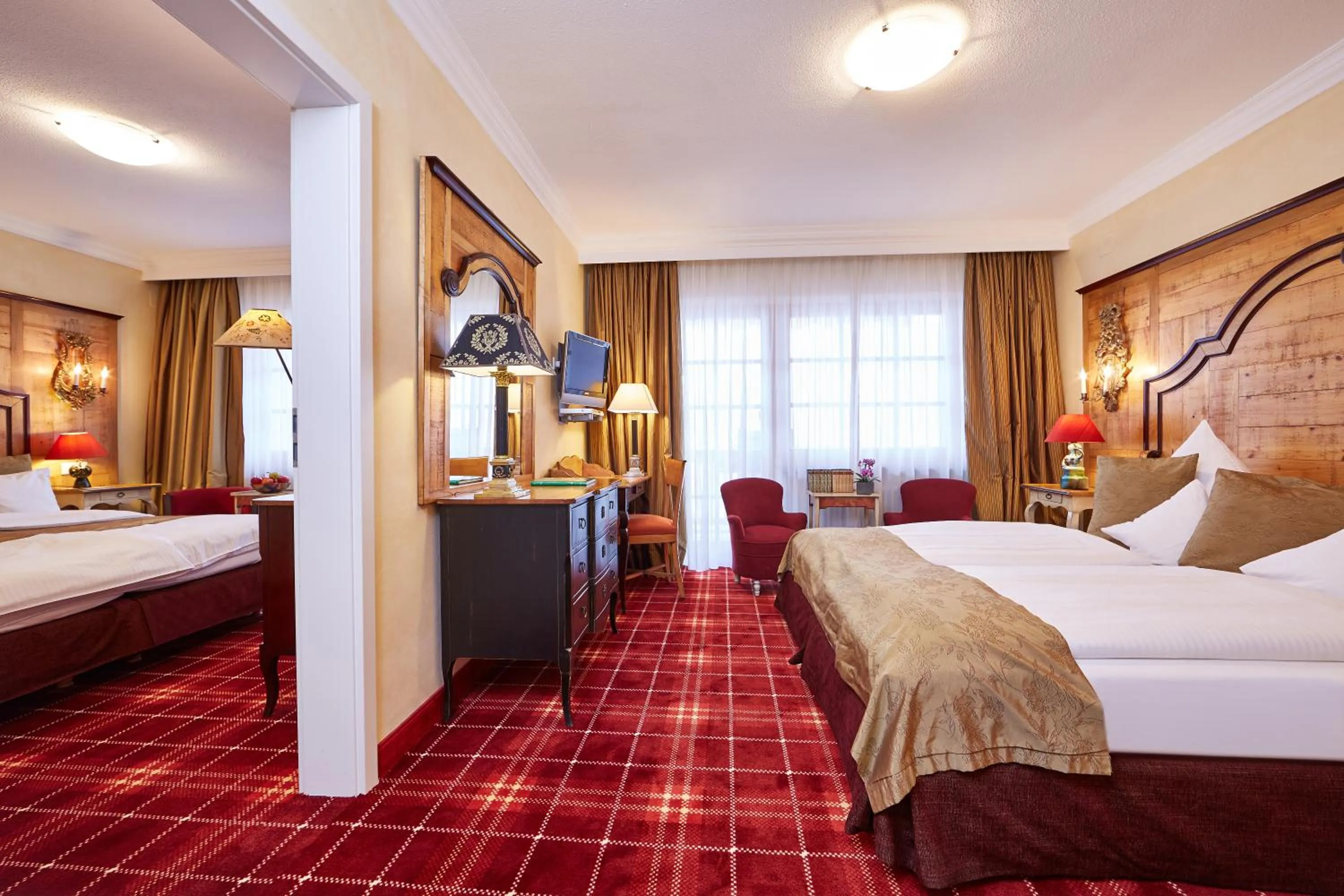 Photo of the whole room, Bed in Romantik Alpenhotel Waxenstein