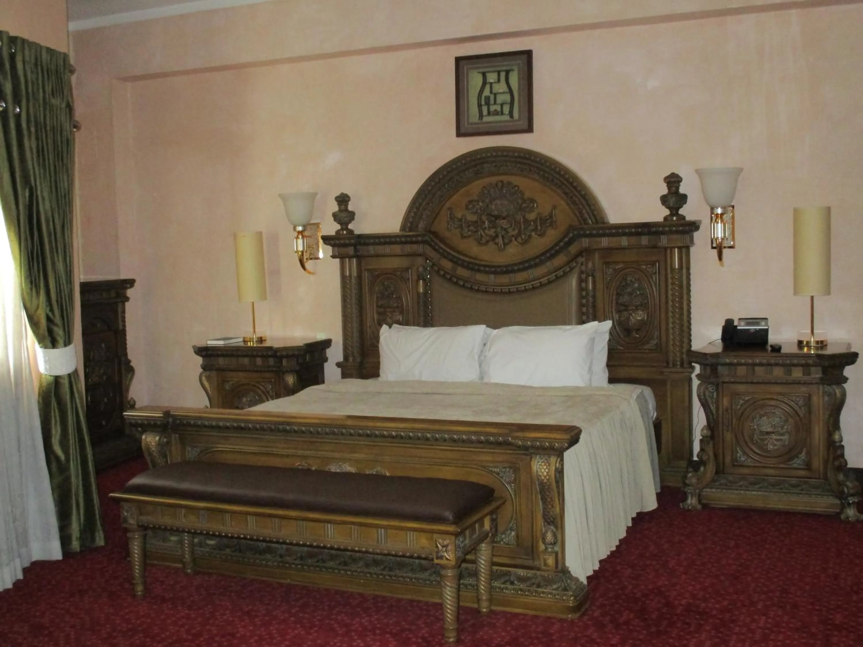 Bed in Imperial Royale Hotel