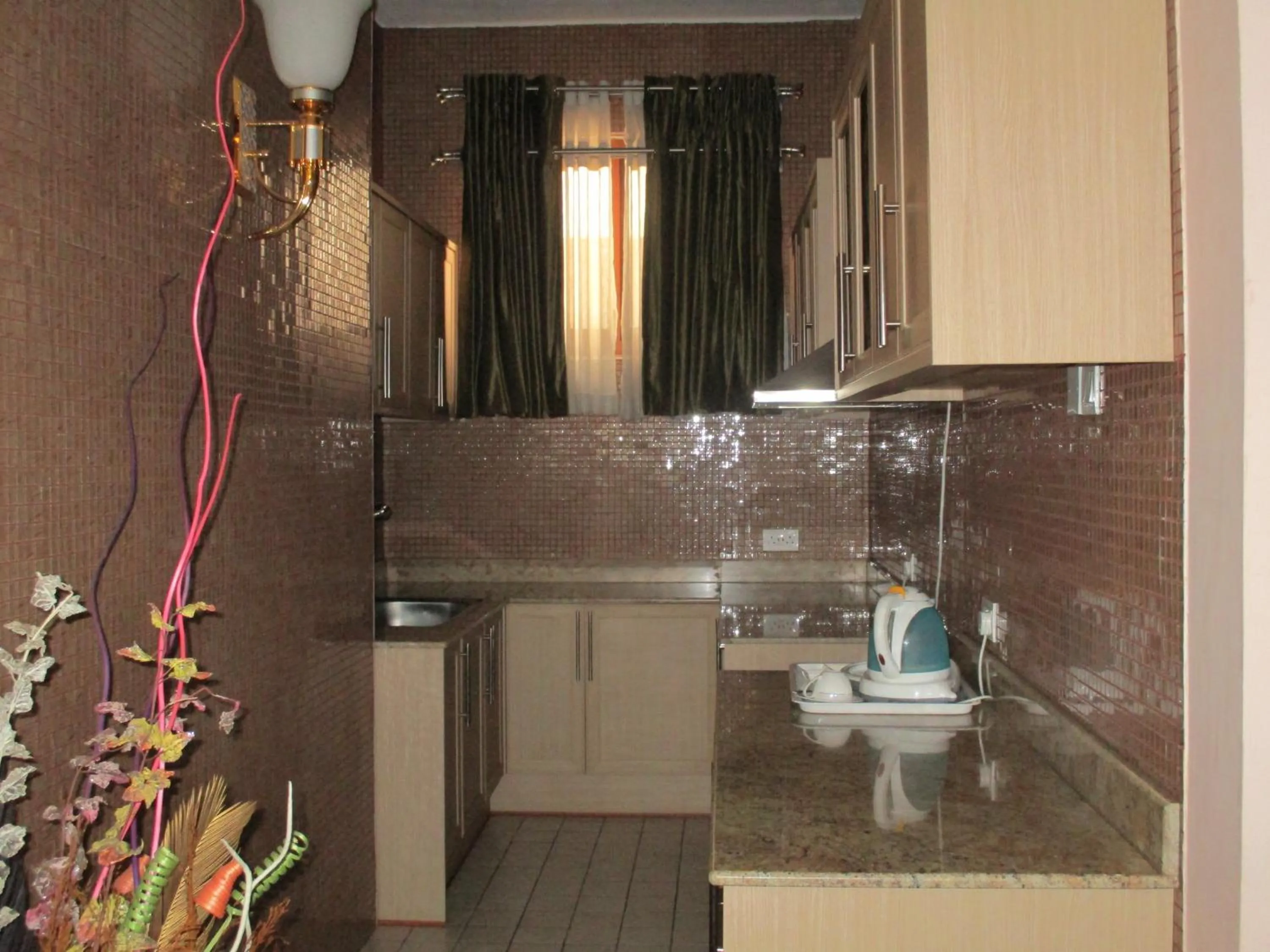 Kitchen or kitchenette in Imperial Royale Hotel
