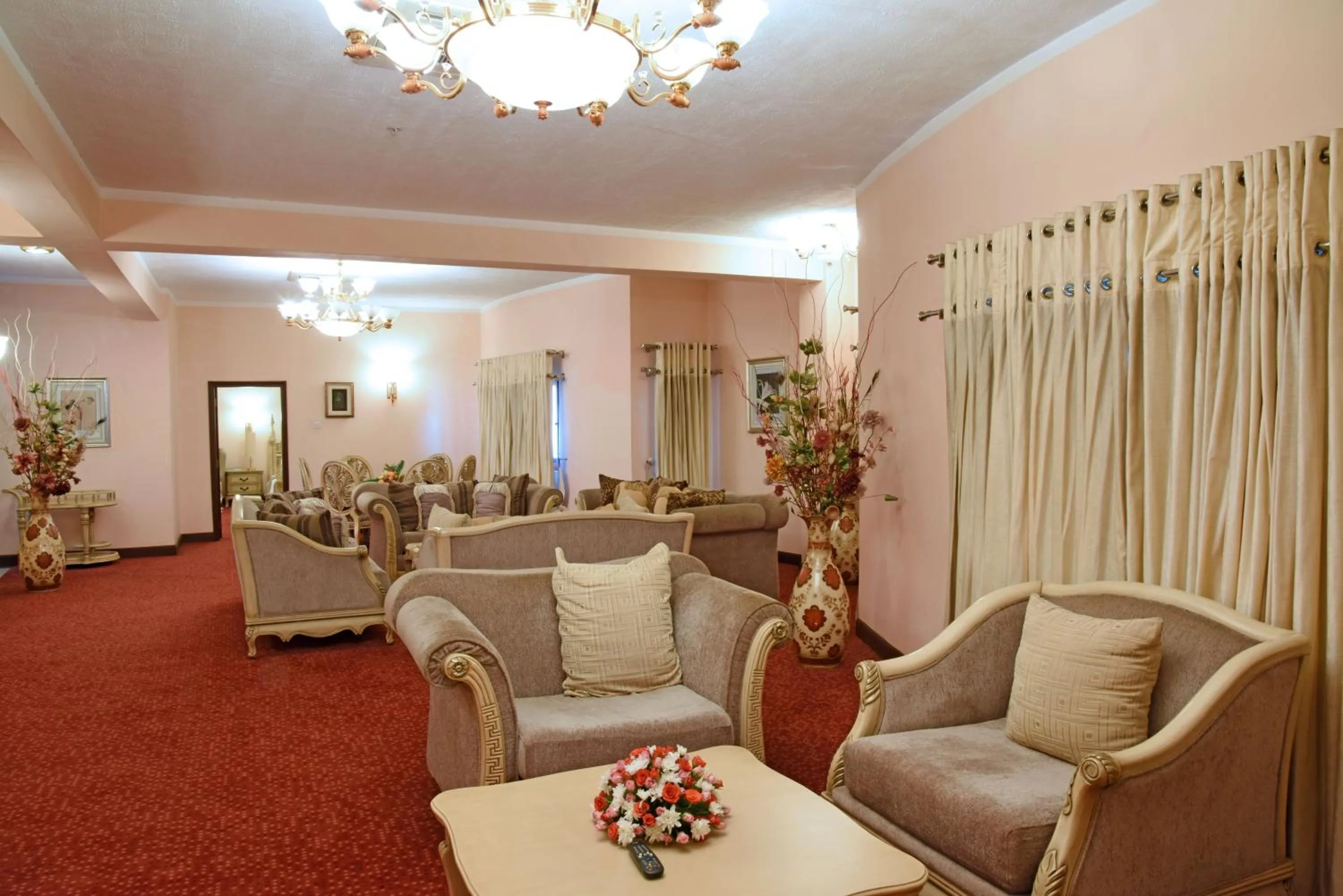 Communal lounge/ TV room in Imperial Royale Hotel