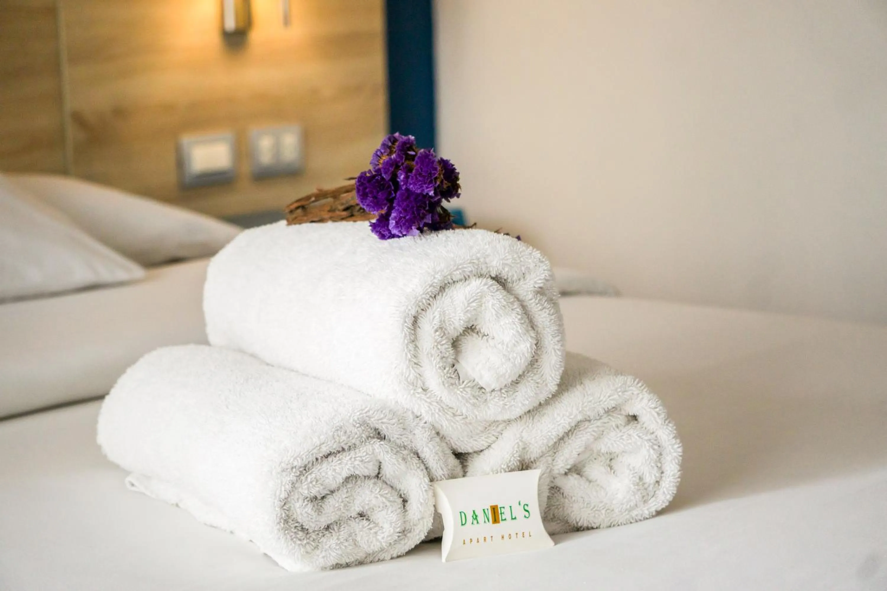 towels, Bed in Daniel's Apart Hotel