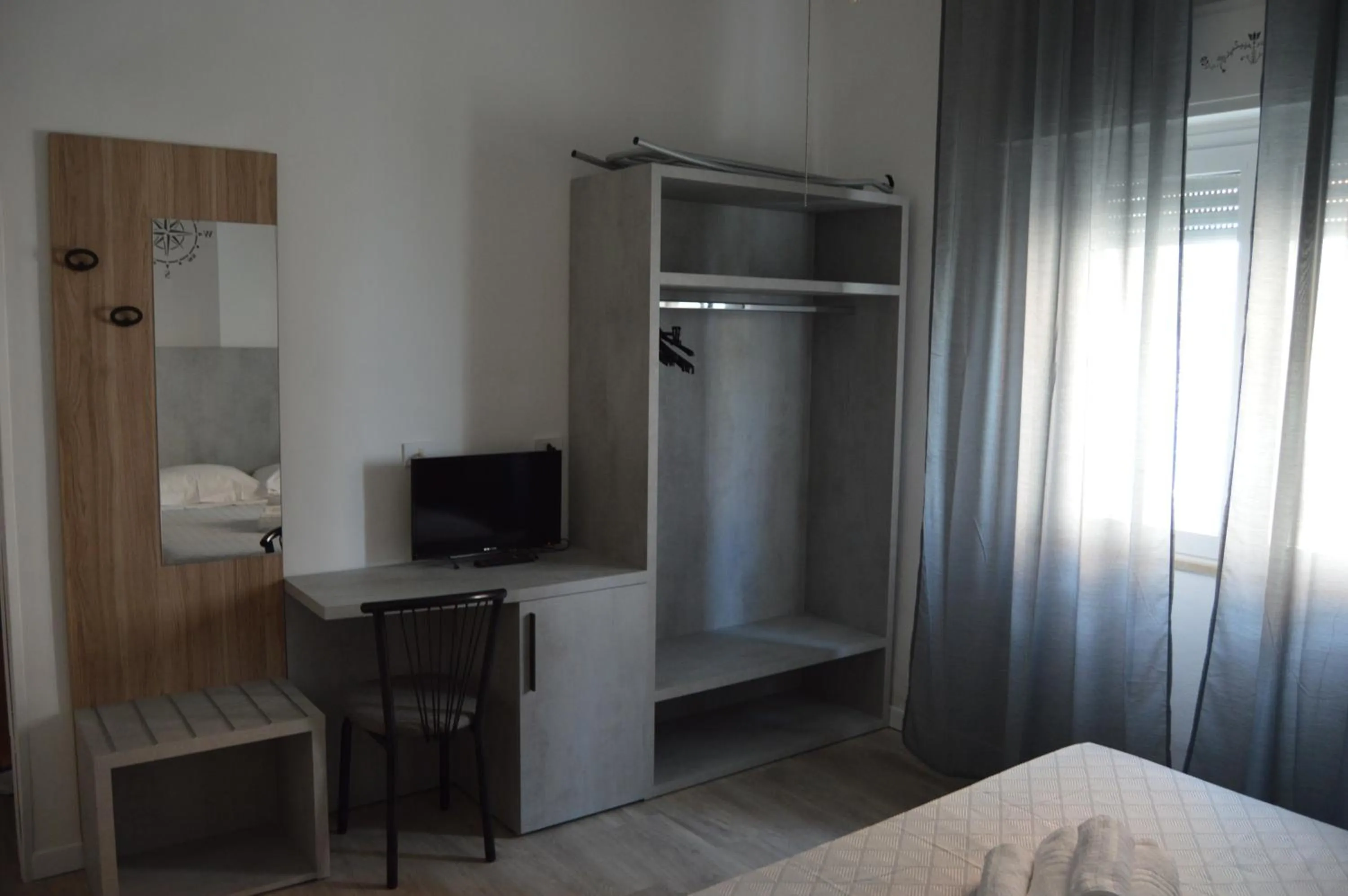 Photo of the whole room, Bed in Pensione Rossi