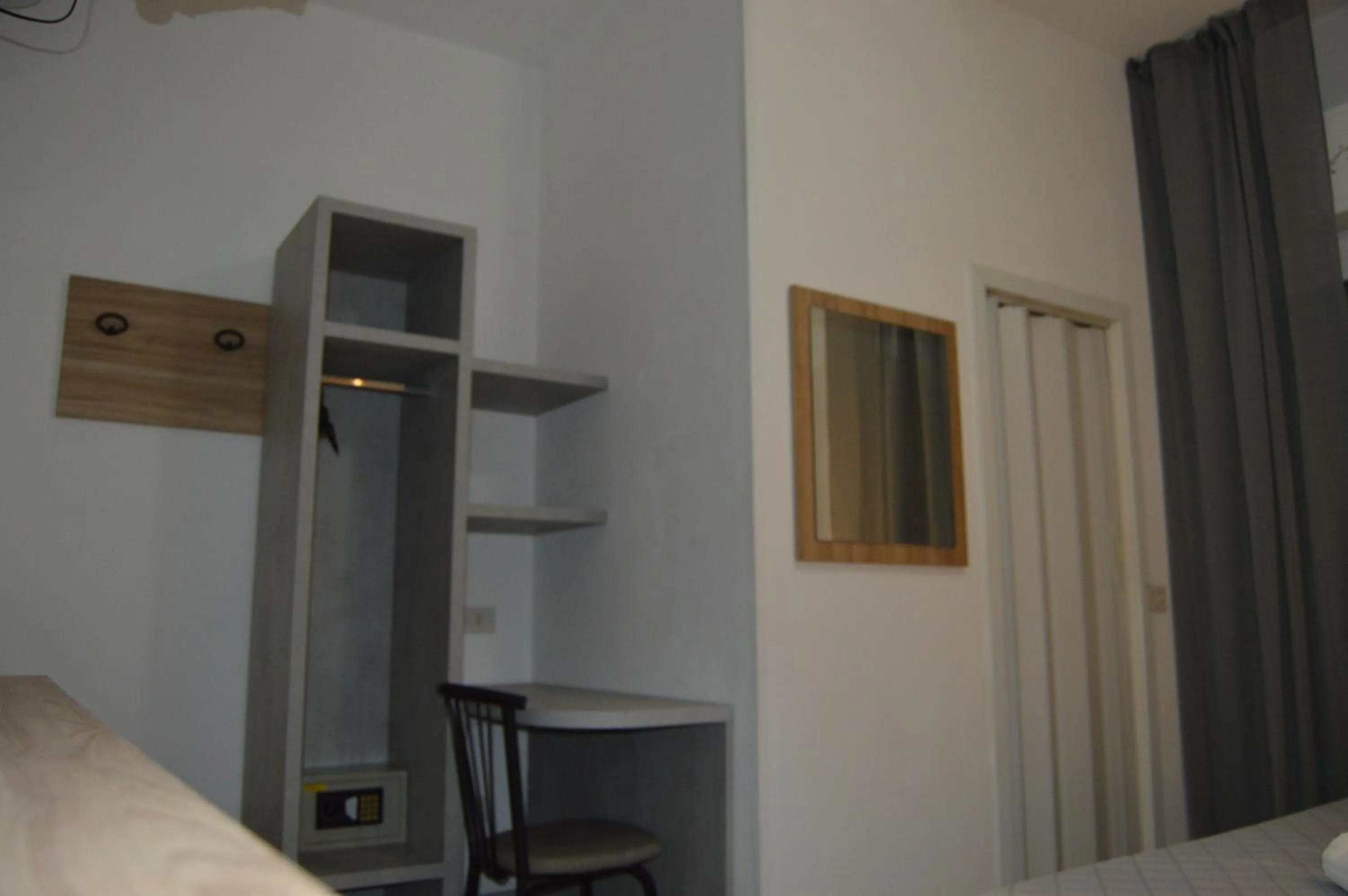 Photo of the whole room, Bed in Pensione Rossi