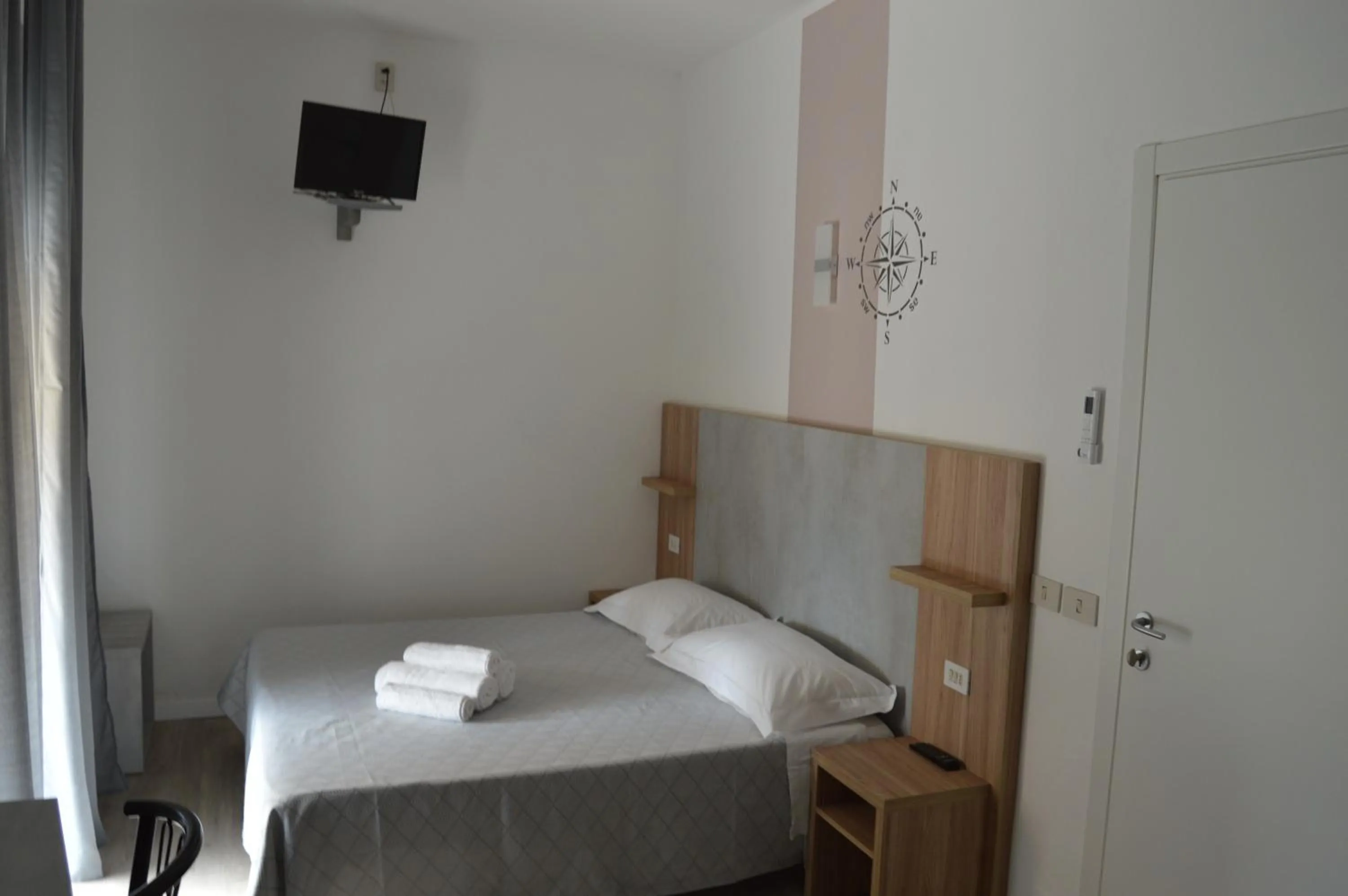 Photo of the whole room, Bed in Pensione Rossi