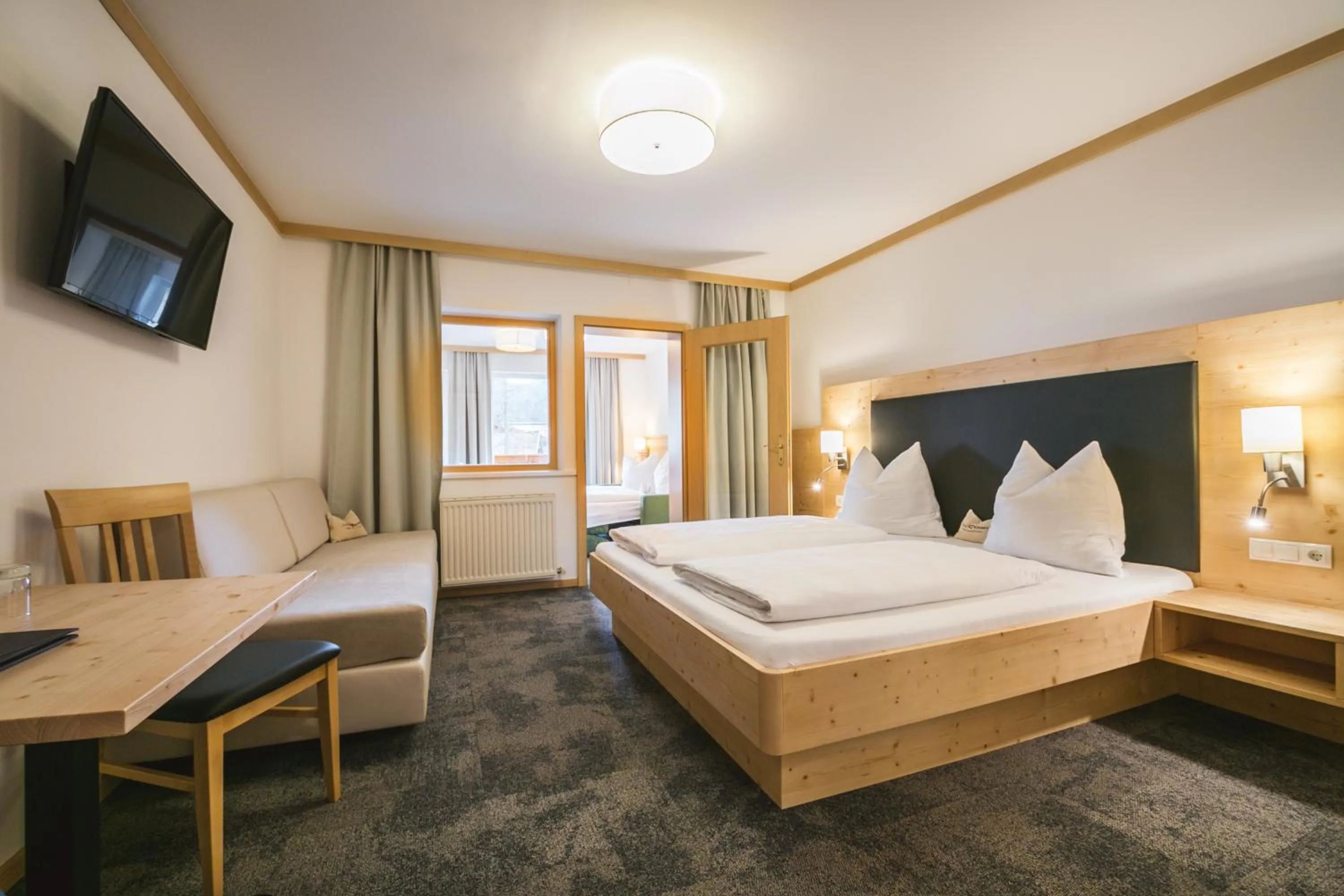 Photo of the whole room, Bed in Familienhotel Botenwirt