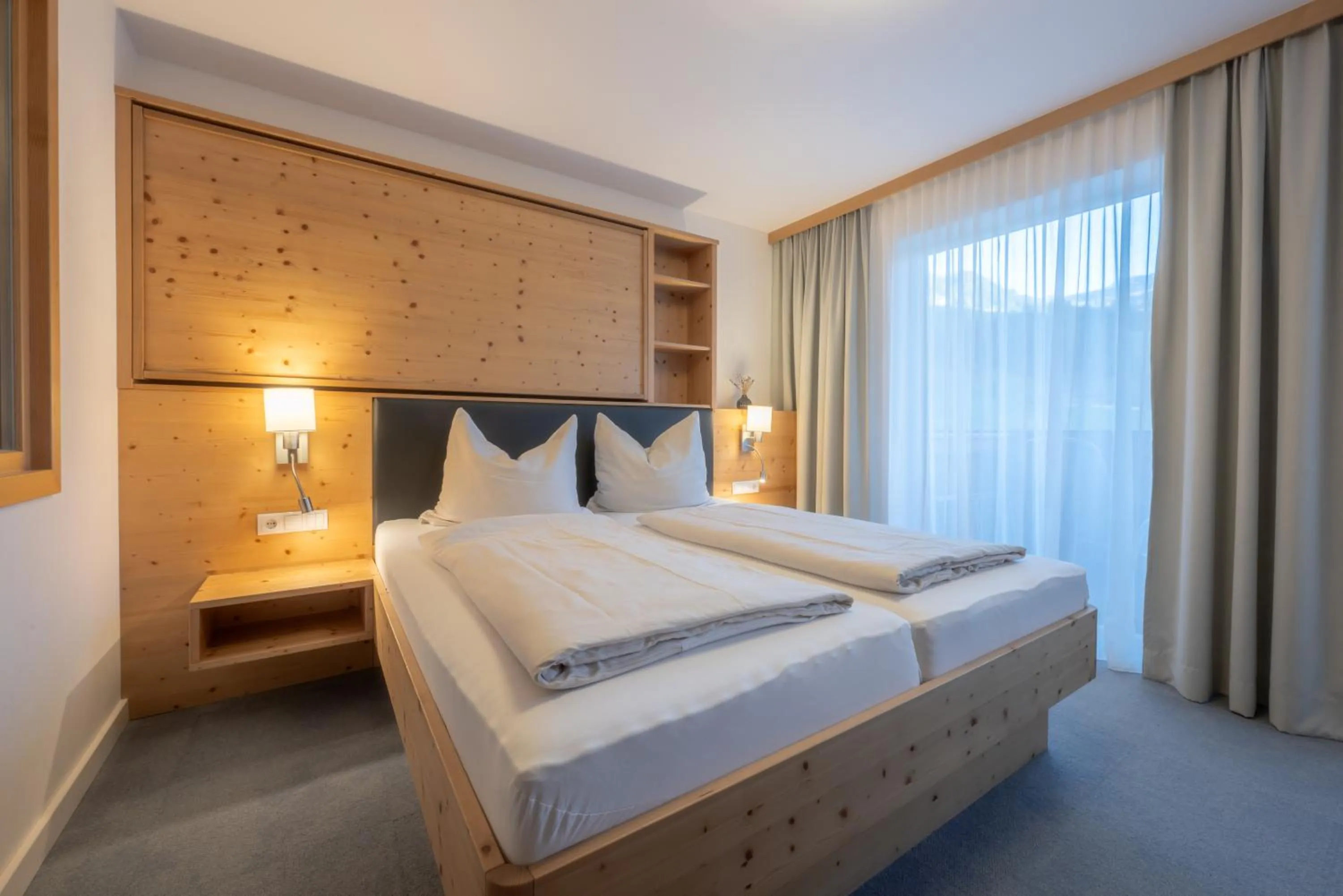 Photo of the whole room, Bed in Familienhotel Botenwirt