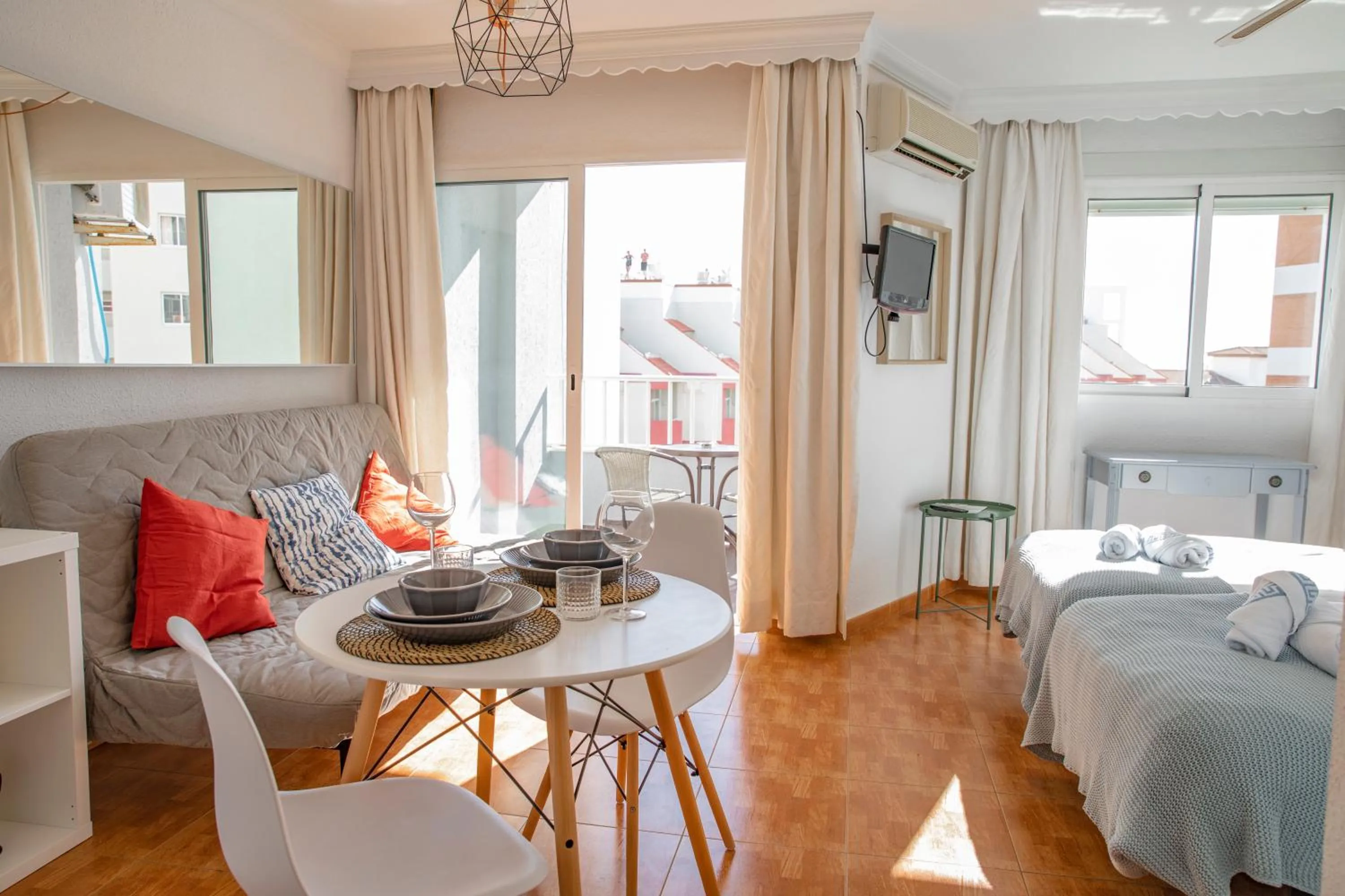 Living room, Bed in Palm Beach Club Apartamentos Carihuela