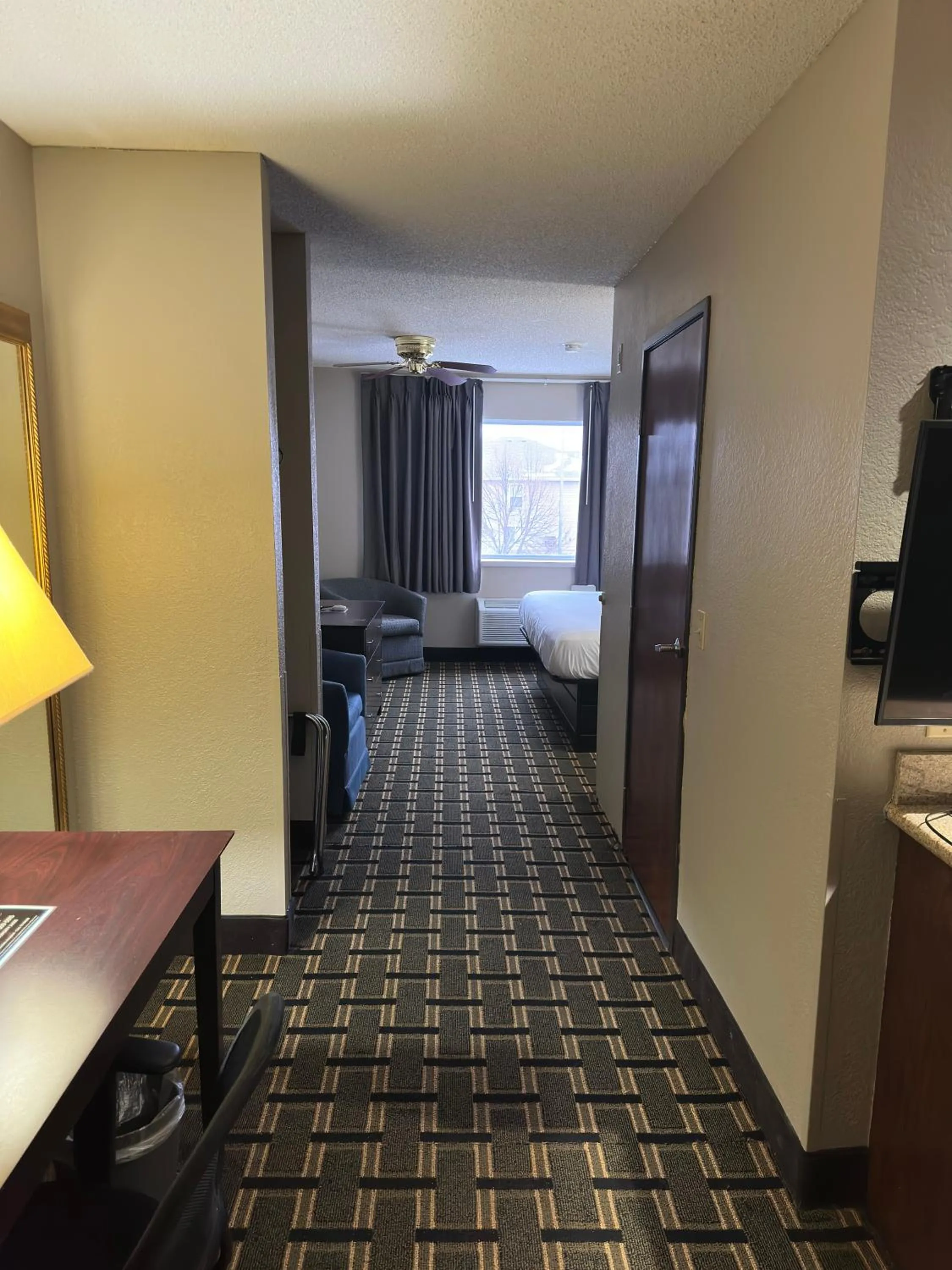 Bed in Baymont Inn & Suites by Wyndham Lincoln NE