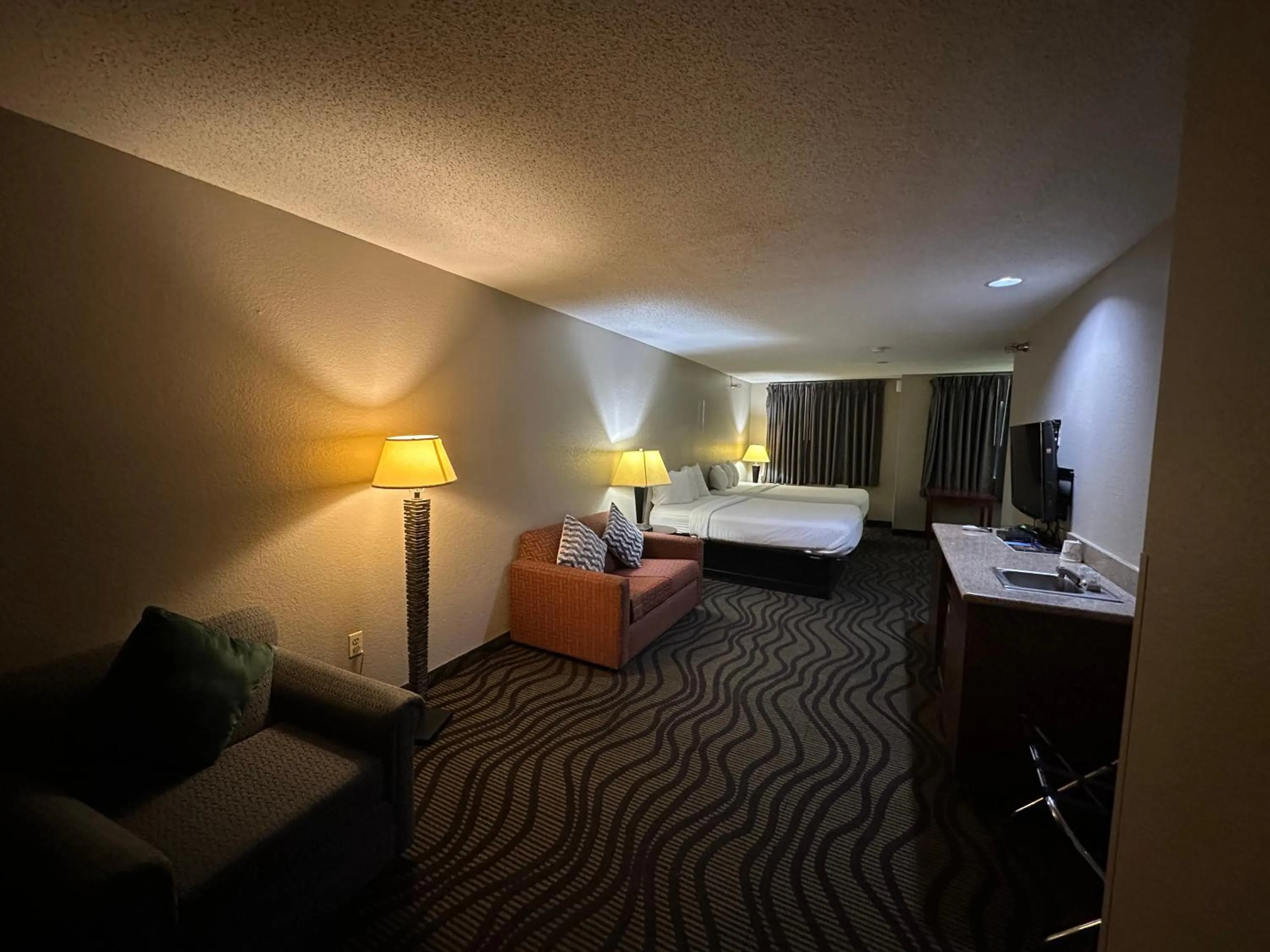Bed in Baymont Inn & Suites by Wyndham Lincoln NE