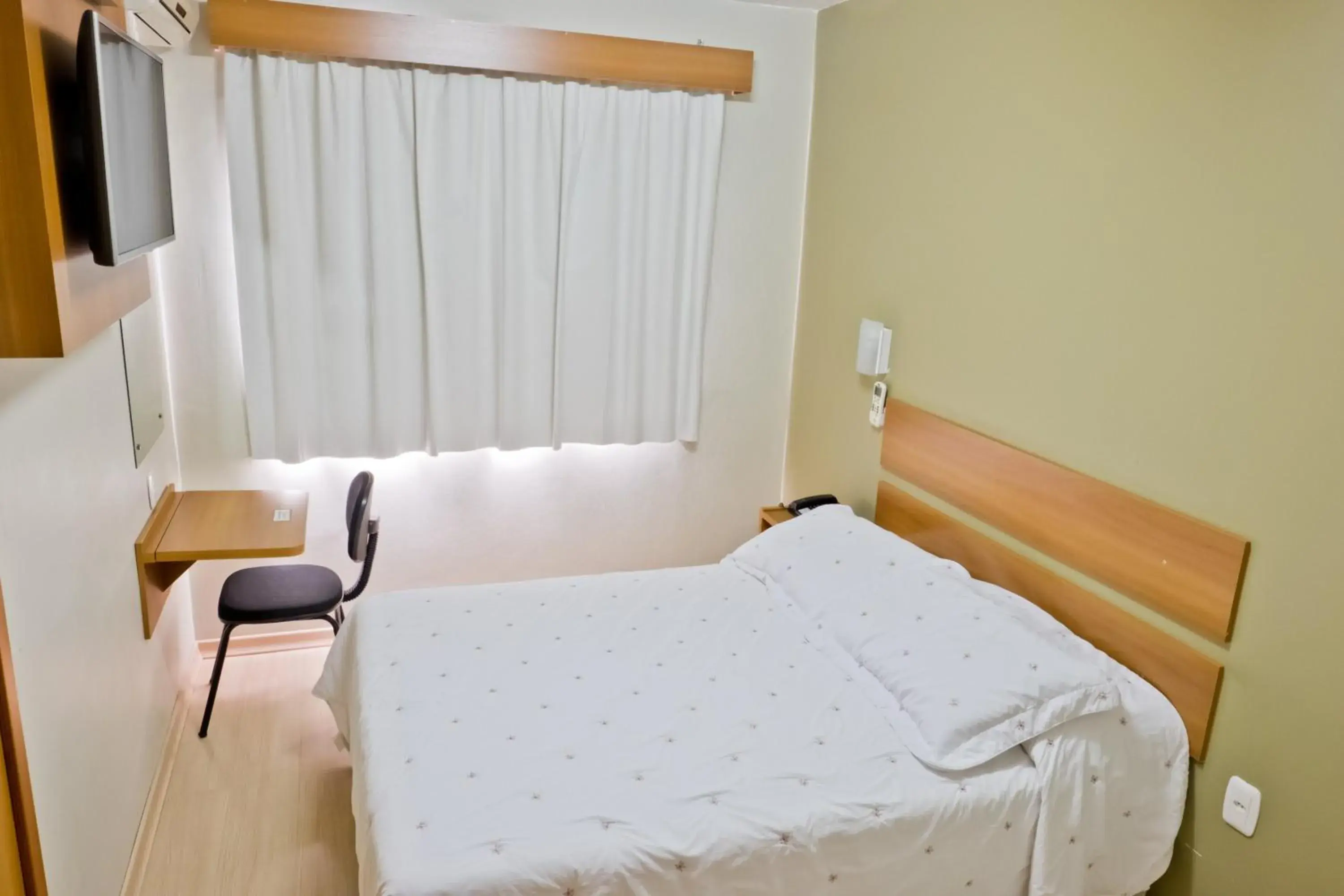 Bed in Tri Hotel Centro Chapecó Bed in Tri Hotel Centro Chapecó