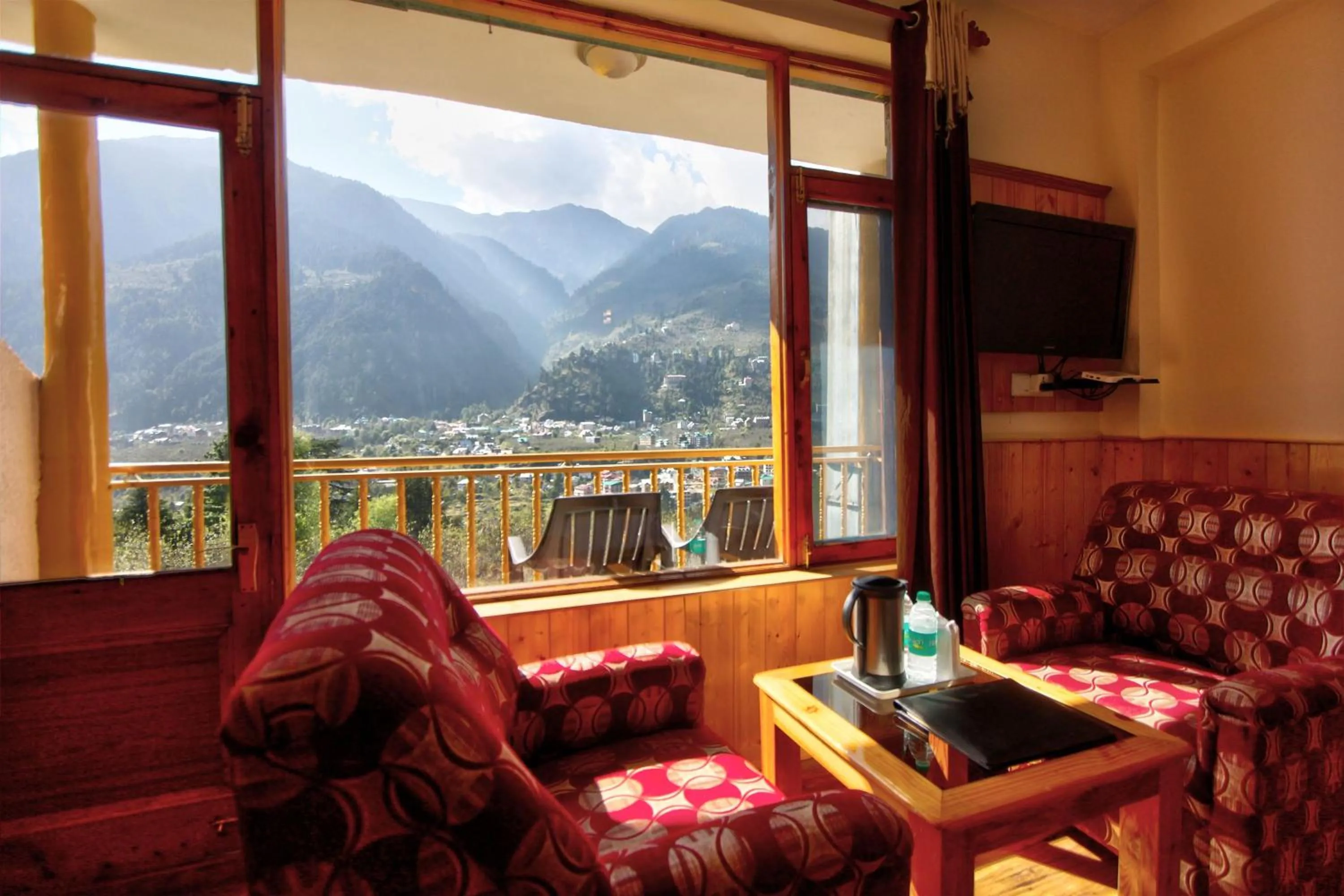 Seating area in Hotel Mountain face by Snow City Hotels