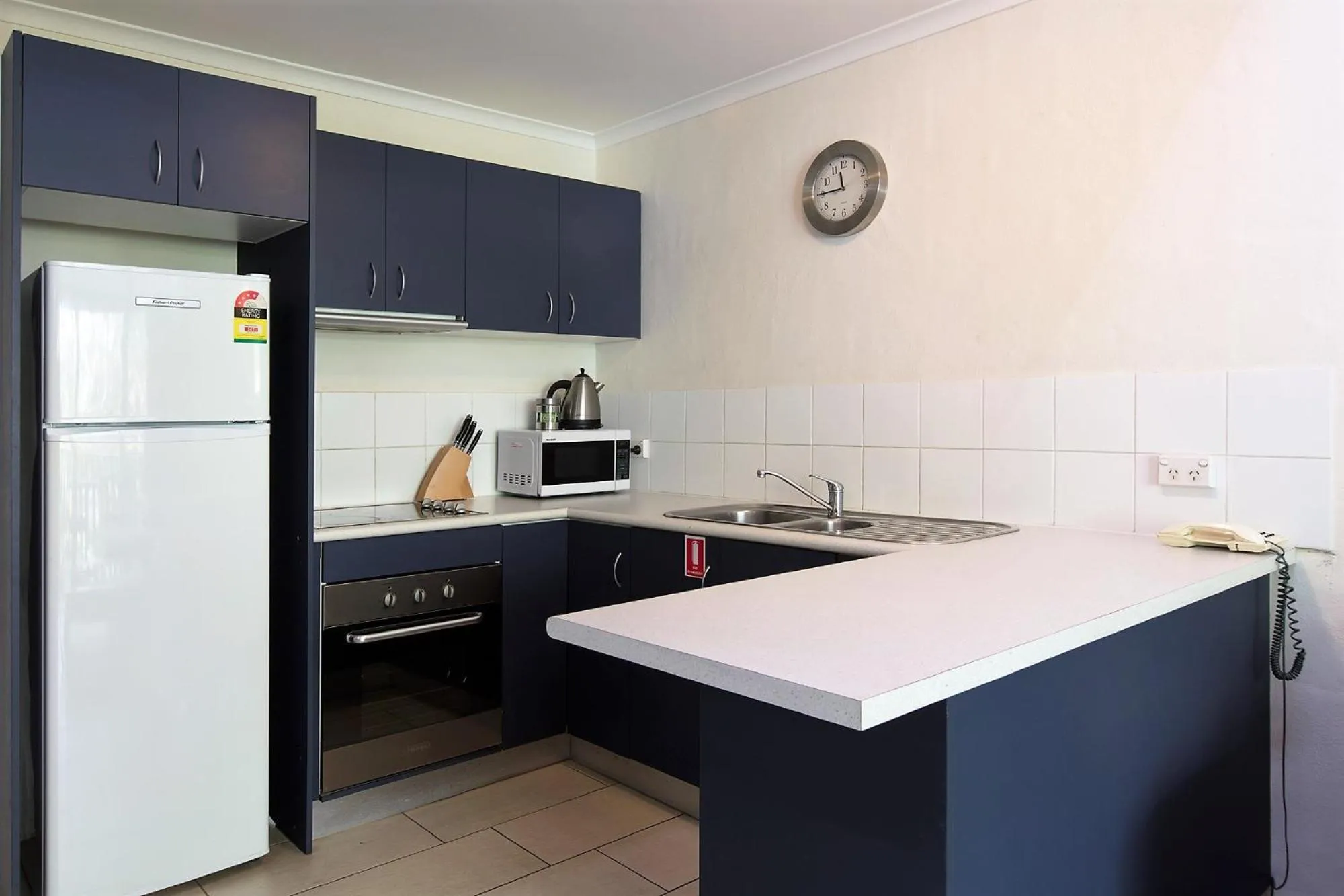 Kitchen or kitchenette in Coral Sea Villas