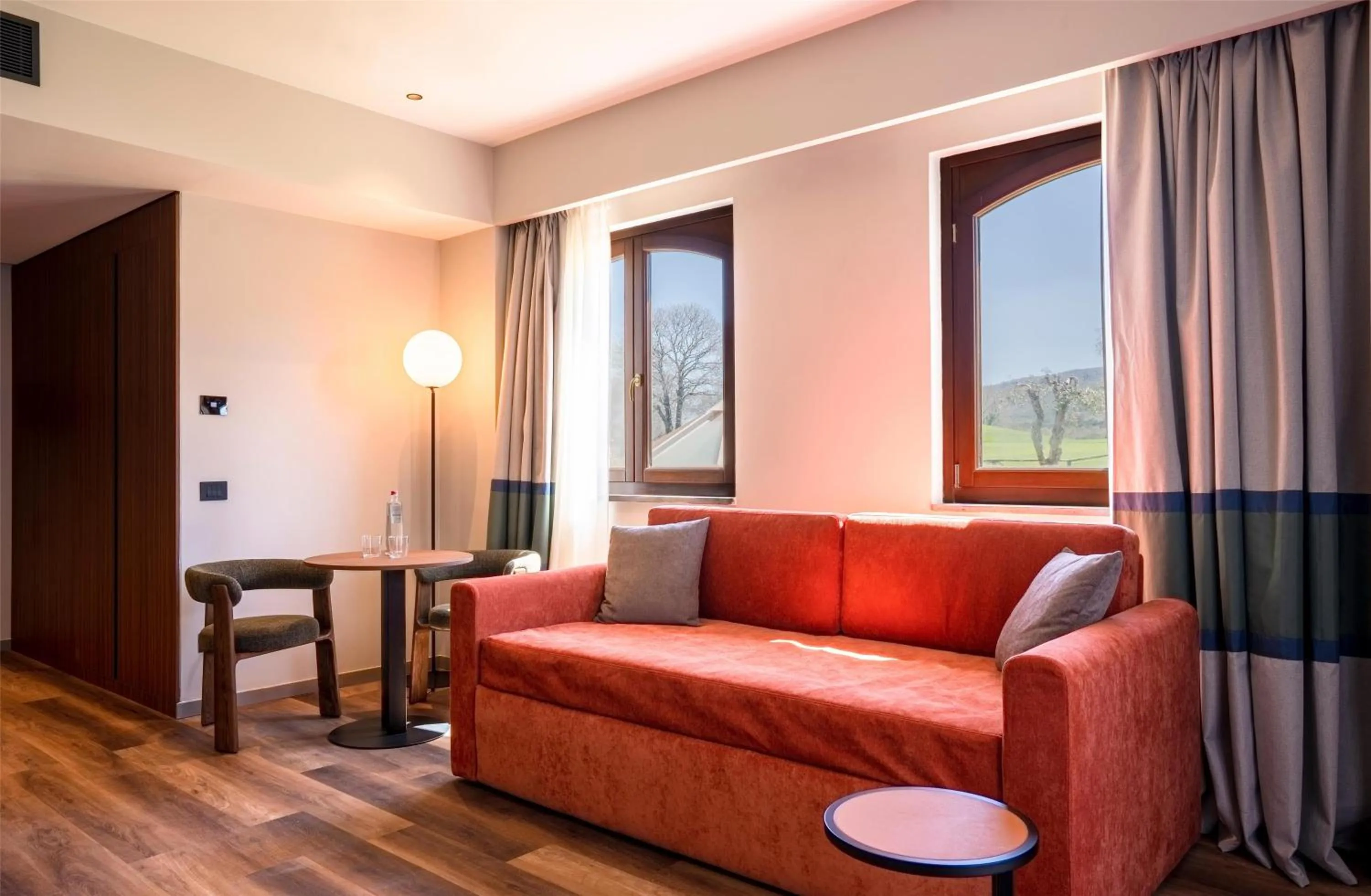 Living room in Picciolo Etna Golf Resort & Spa, Curio Collection by Hilton