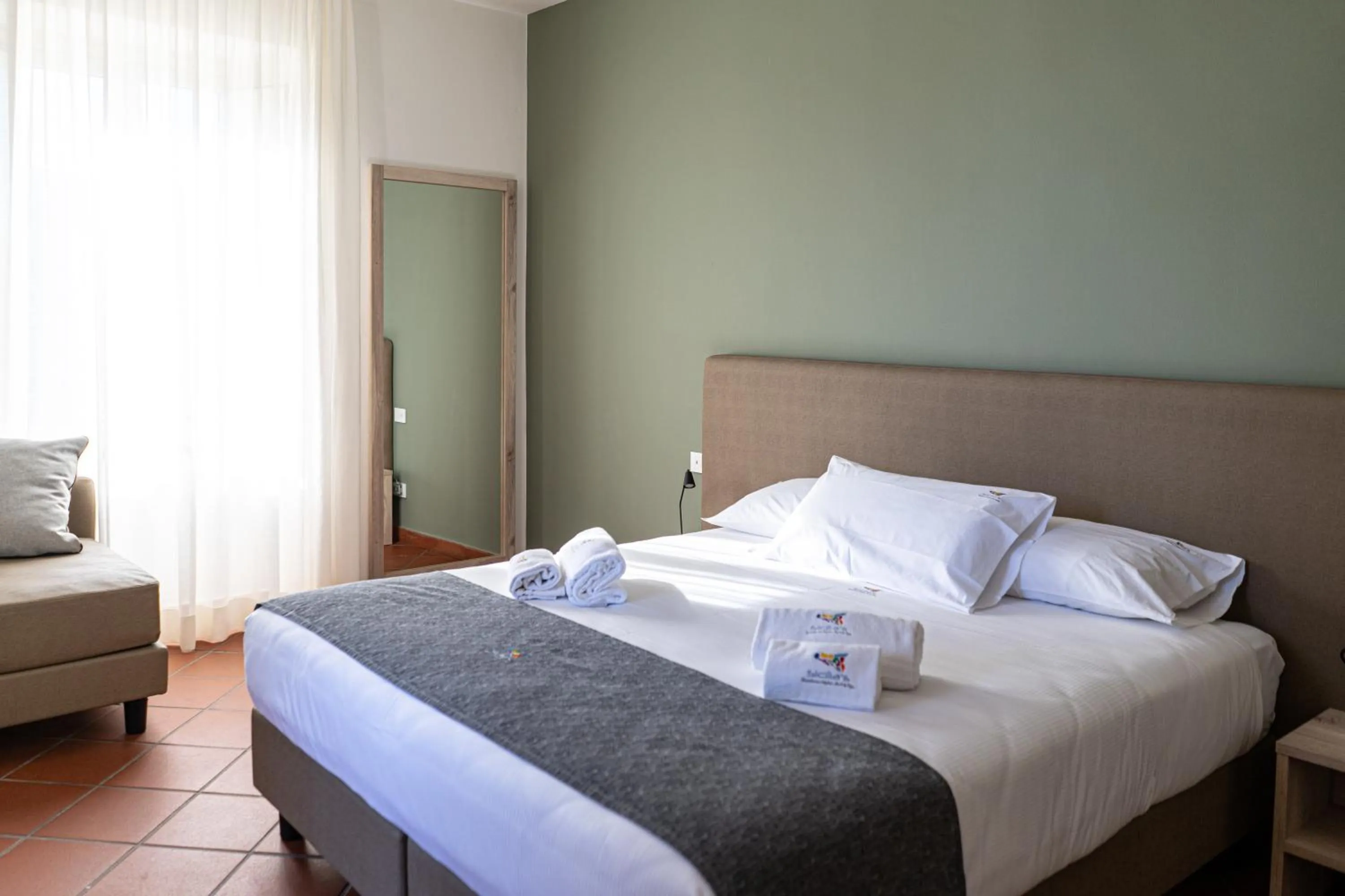 Bed in Picciolo Etna Golf Resort & Spa, Curio Collection by Hilton