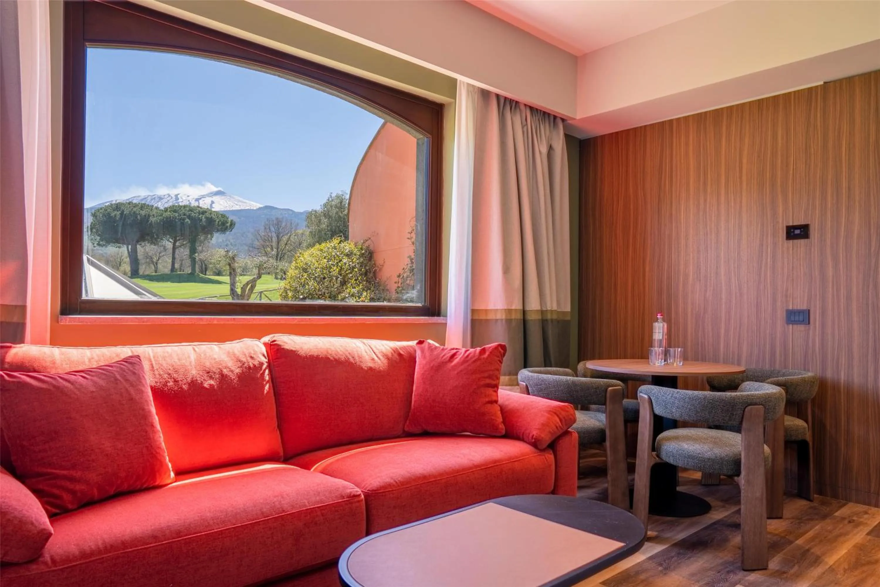 Living room in Picciolo Etna Golf Resort & Spa, Curio Collection by Hilton