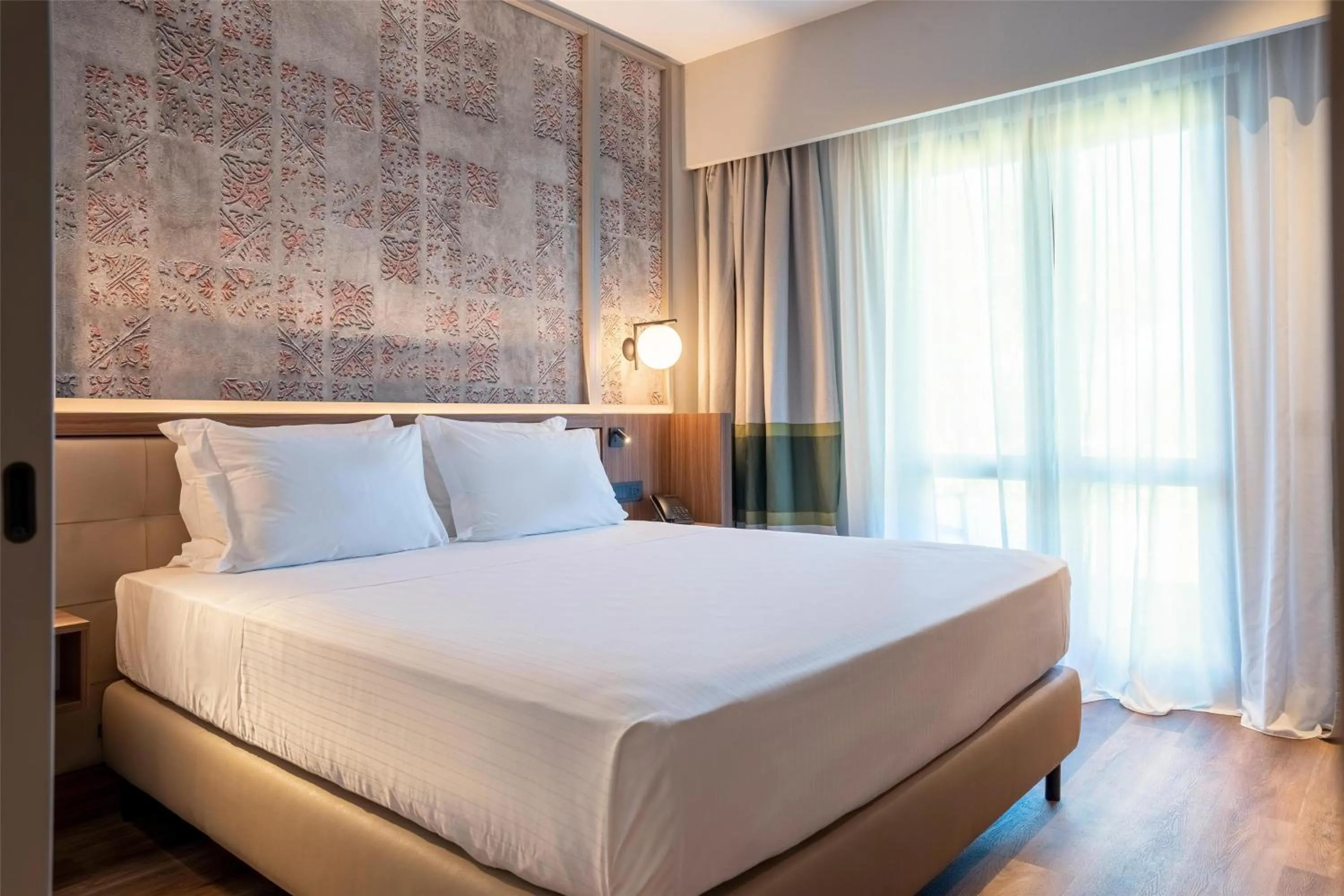 Bed in Picciolo Etna Golf Resort & Spa, Curio Collection by Hilton