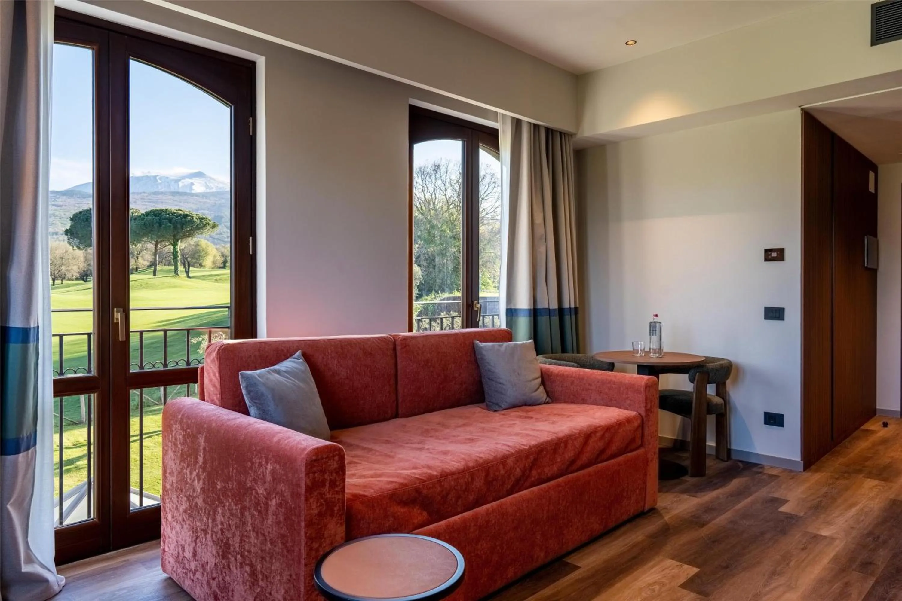Living room in Picciolo Etna Golf Resort & Spa, Curio Collection by Hilton