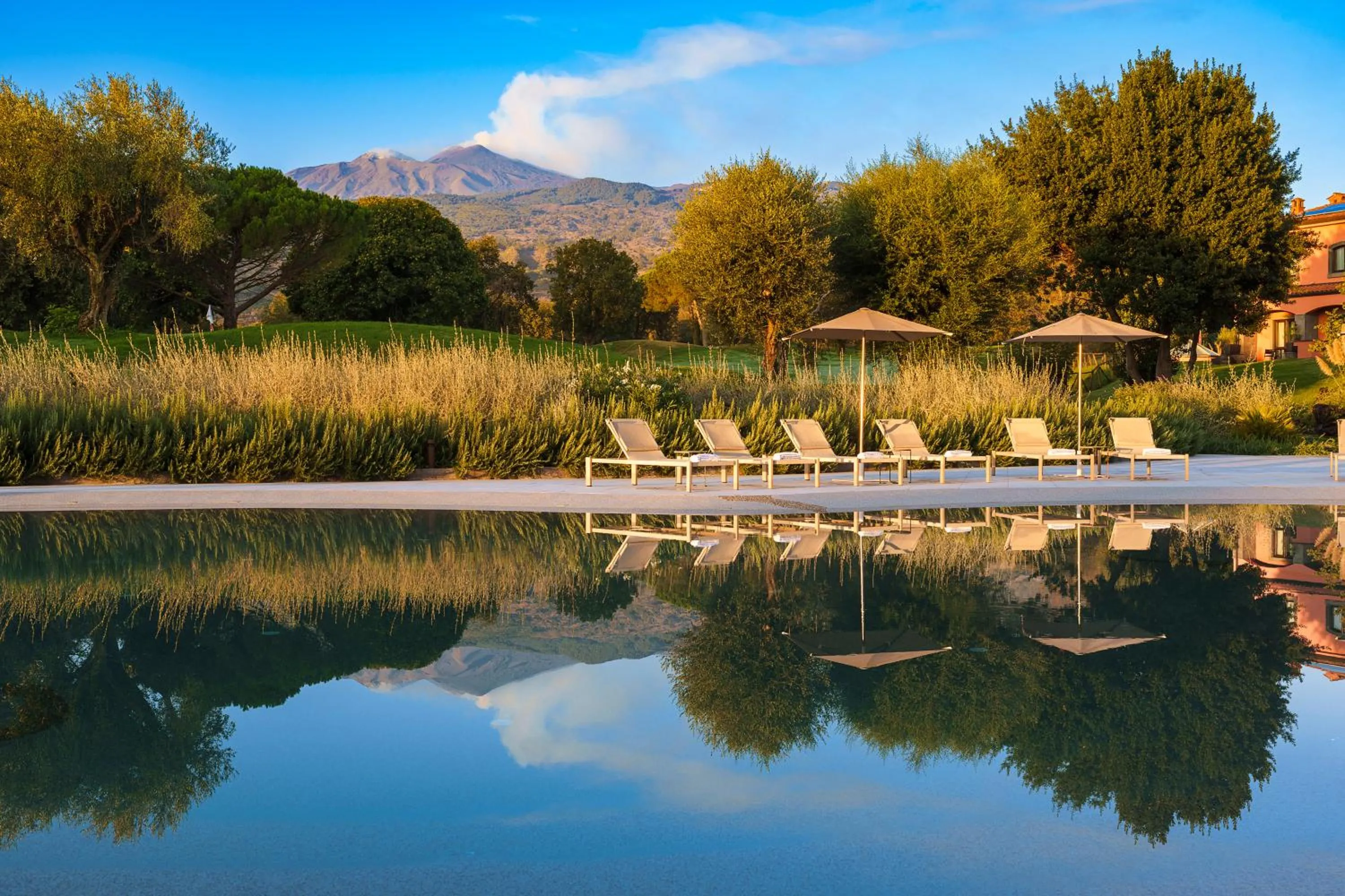 Swimming pool in Picciolo Etna Golf Resort & Spa, Curio Collection by Hilton