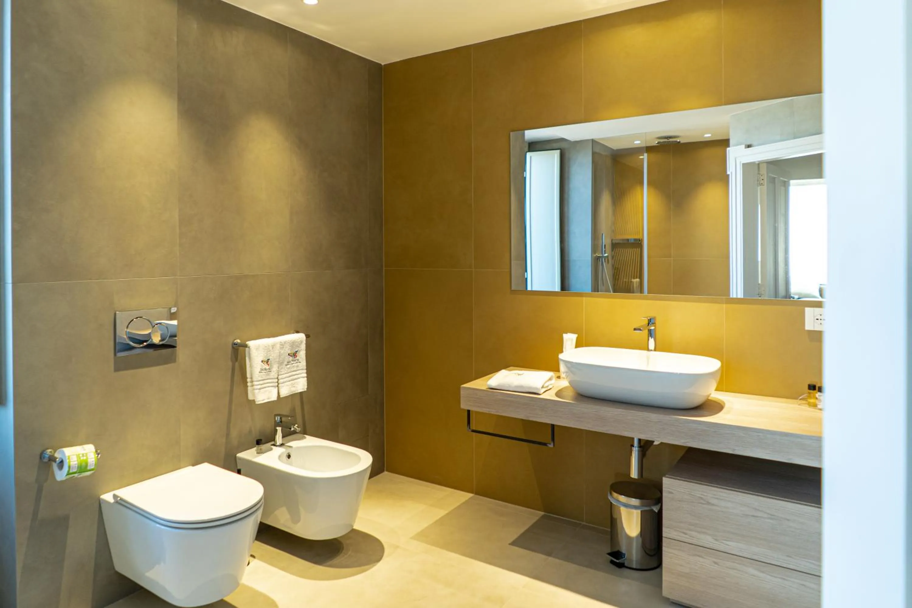 Toilet in Picciolo Etna Golf Resort & Spa, Curio Collection by Hilton