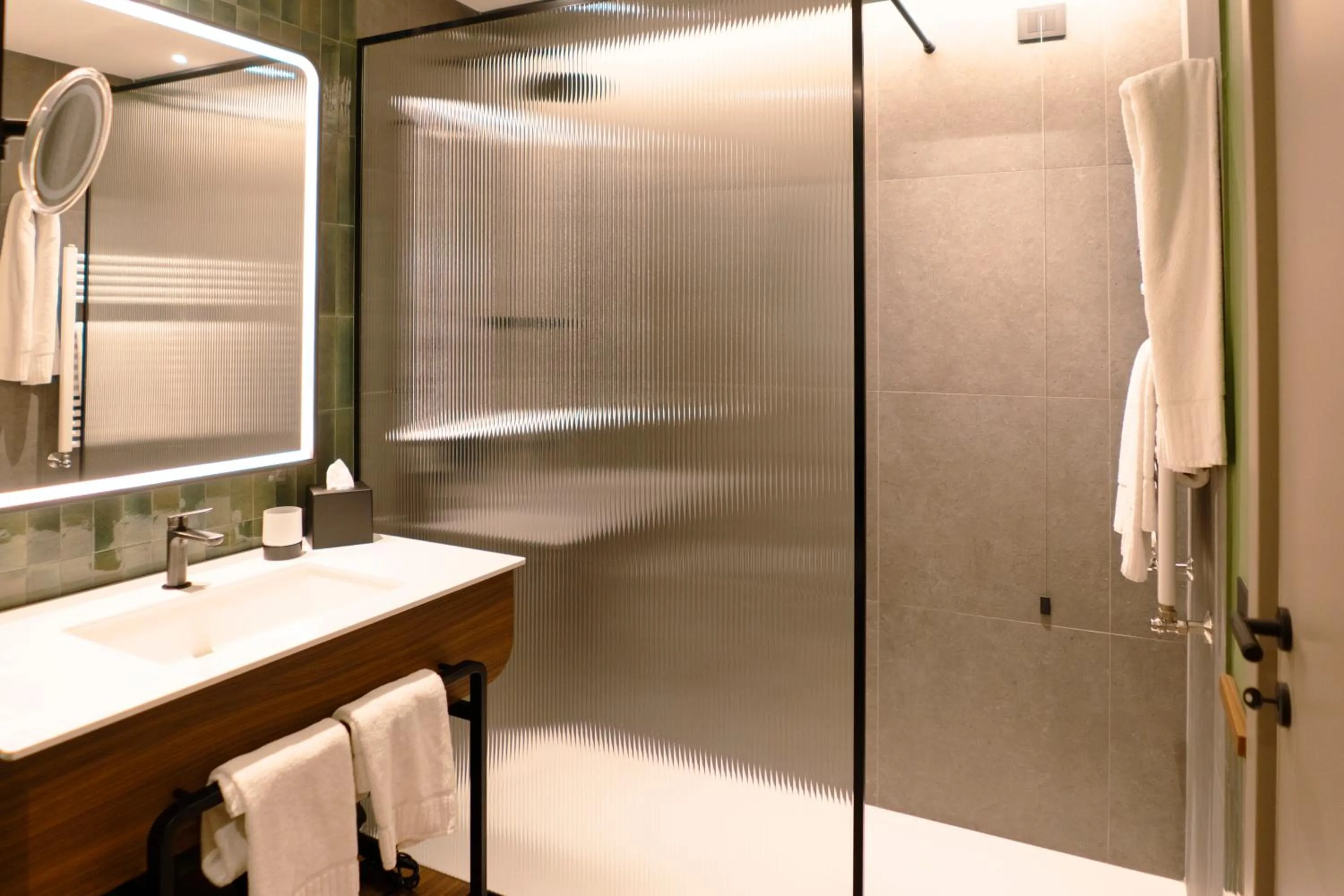 Shower in Picciolo Etna Golf Resort & Spa, Curio Collection by Hilton