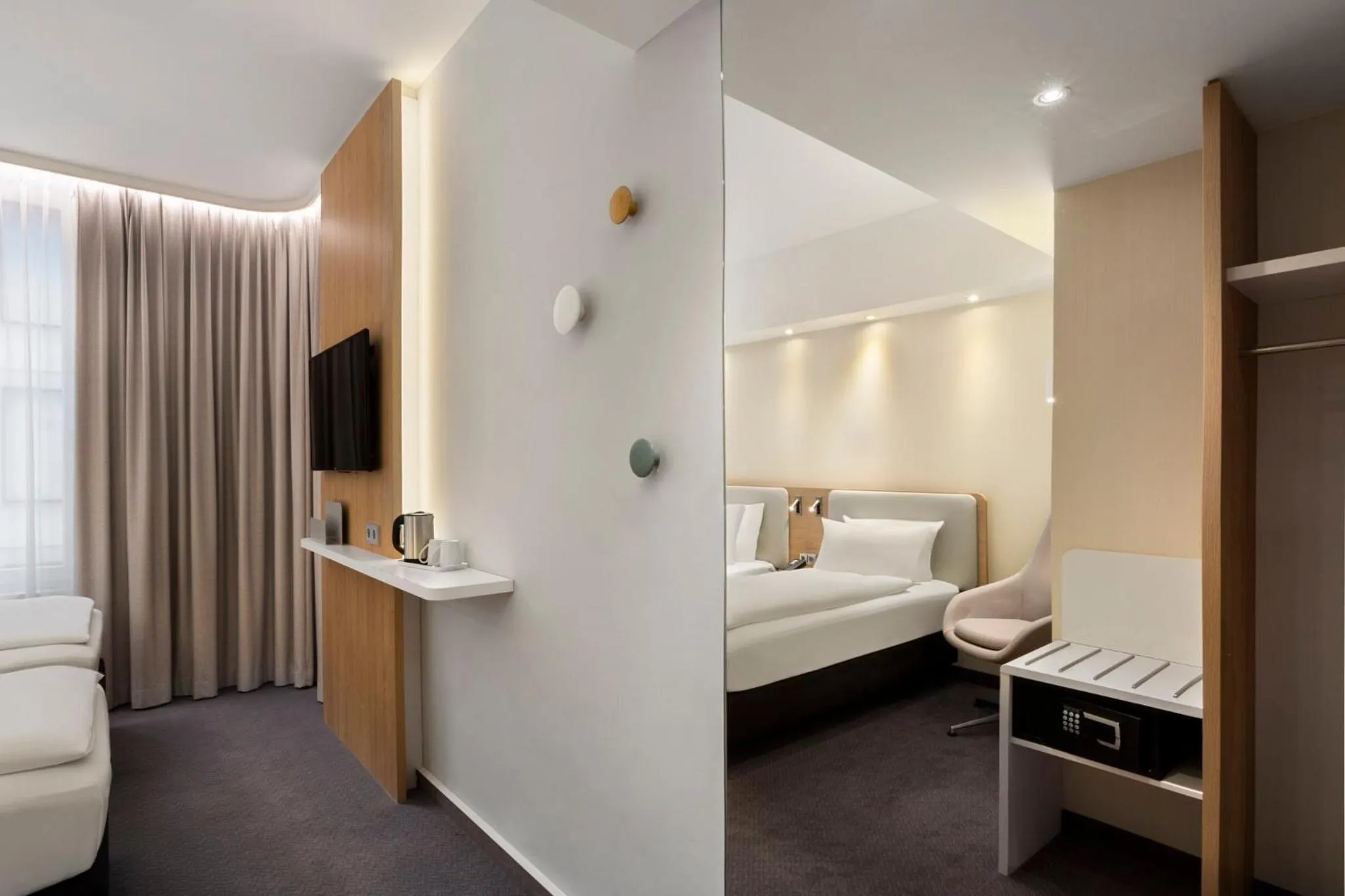 Photo of the whole room, Bed in Holiday Inn Express Munich City West by IHG