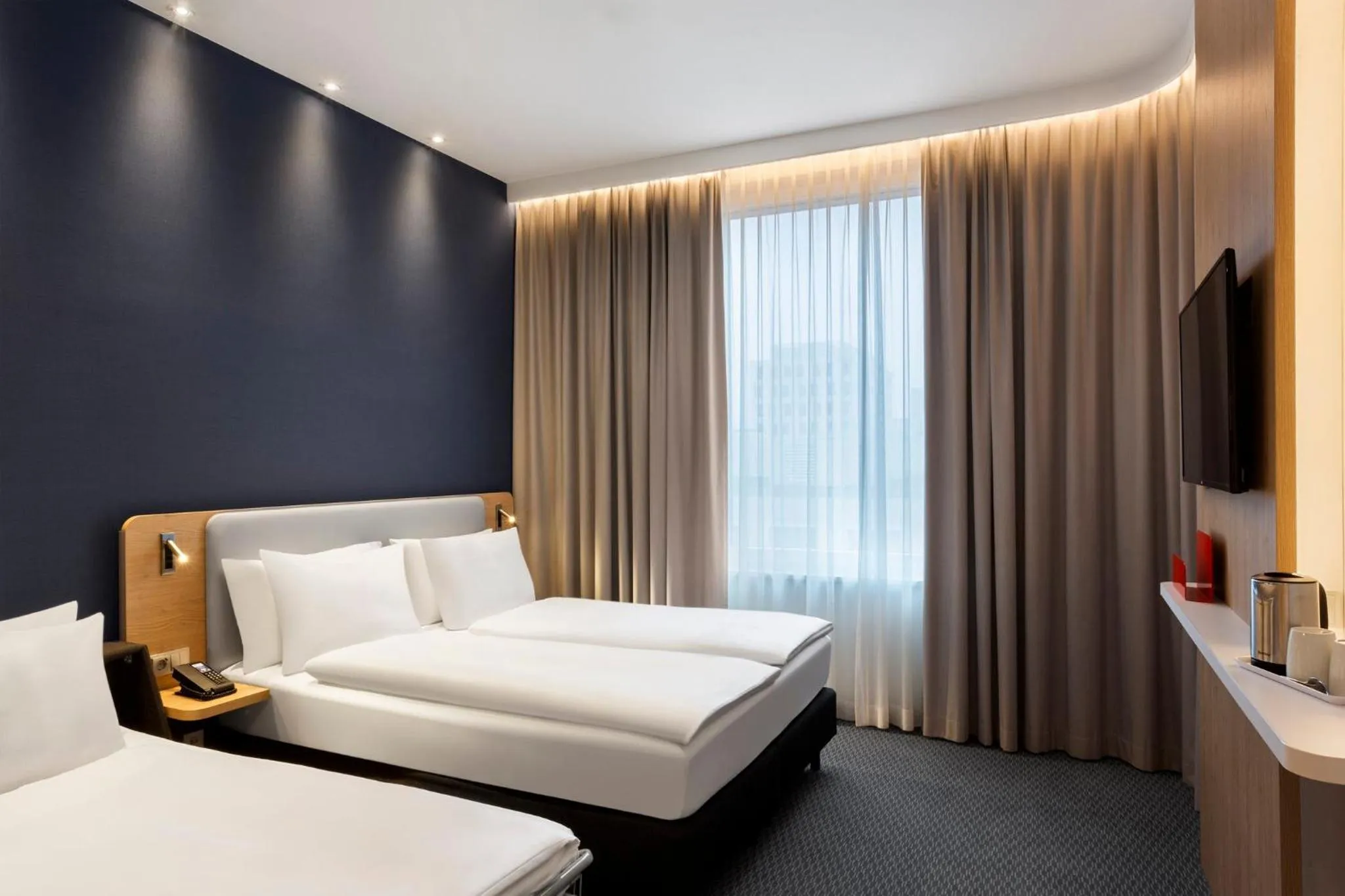 Photo of the whole room, Bed in Holiday Inn Express Munich City West by IHG