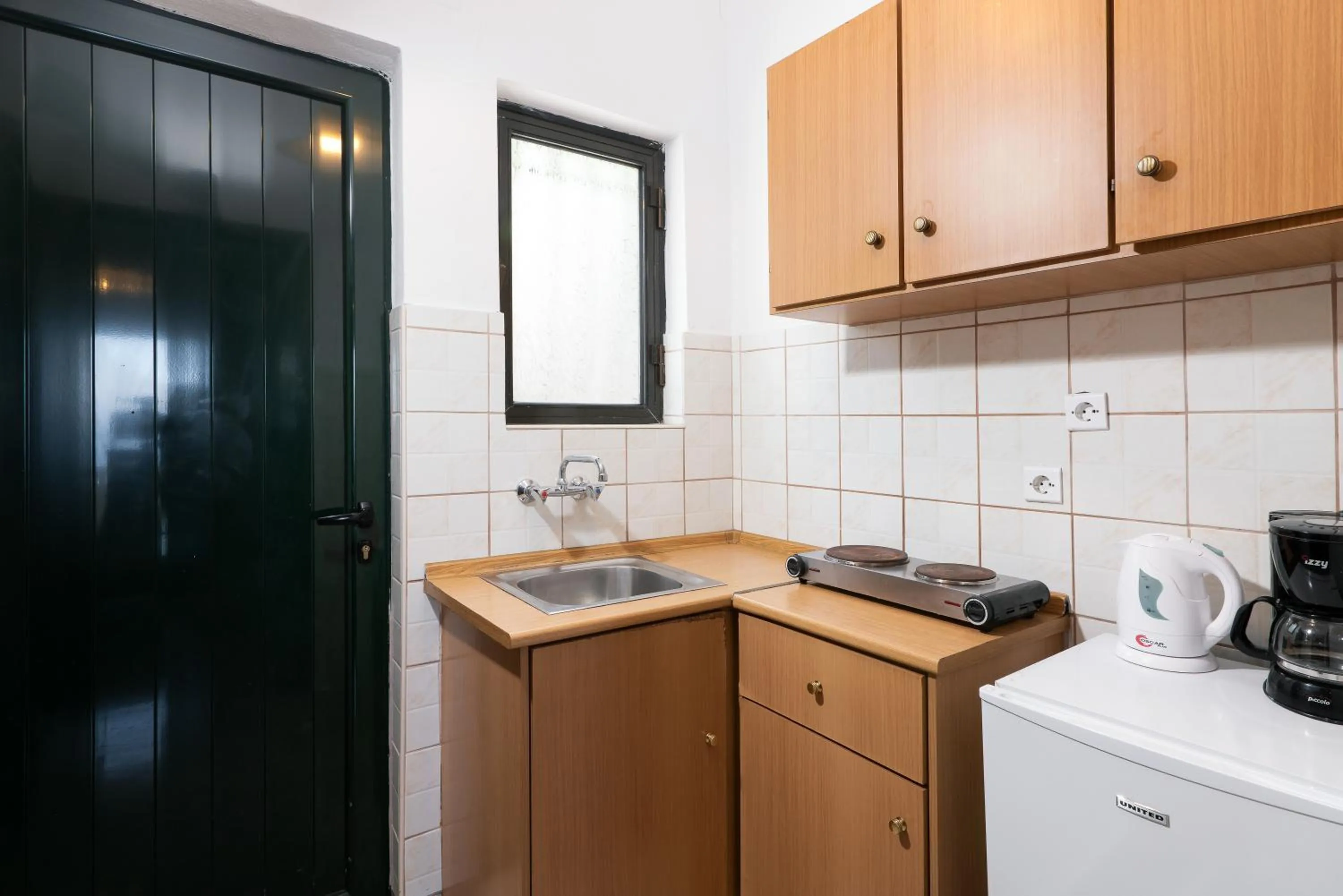 Kitchen or kitchenette in Dimitra Studios