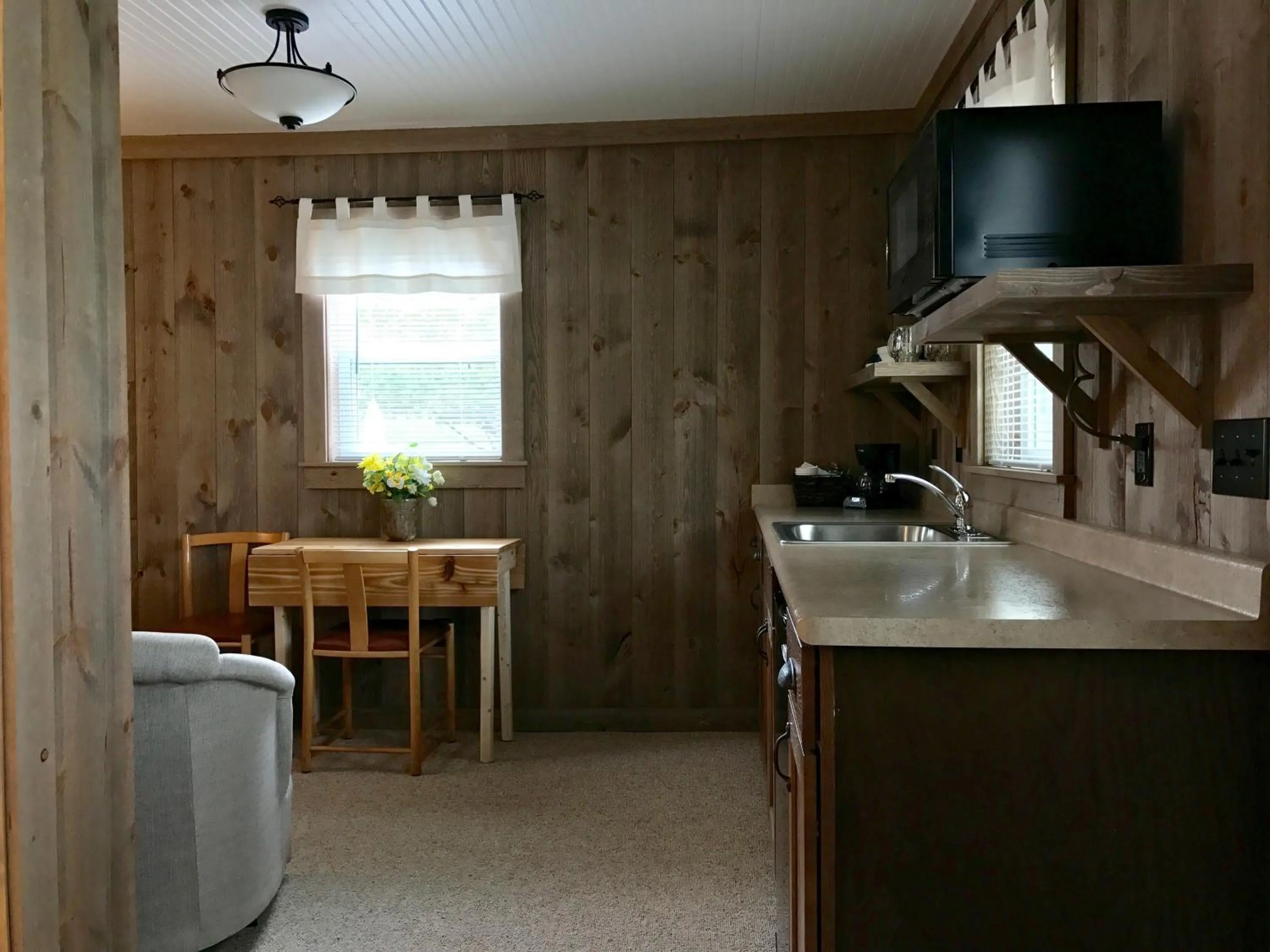 Kitchen or kitchenette in Cedar Ridge Cabins