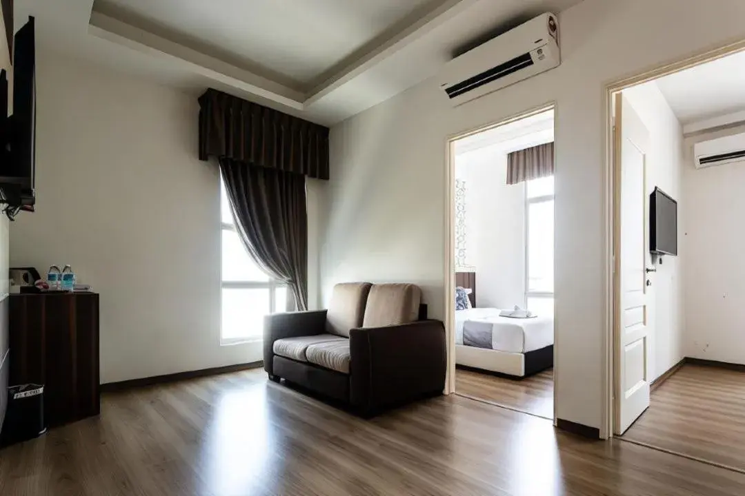 Living room, Bed in THE REED HOTEL MELAKA formerly known as E-Red Hotel Melaka Living room, Bed in THE REED HOTEL MELAKA formerly known as E-Red Hotel Melaka