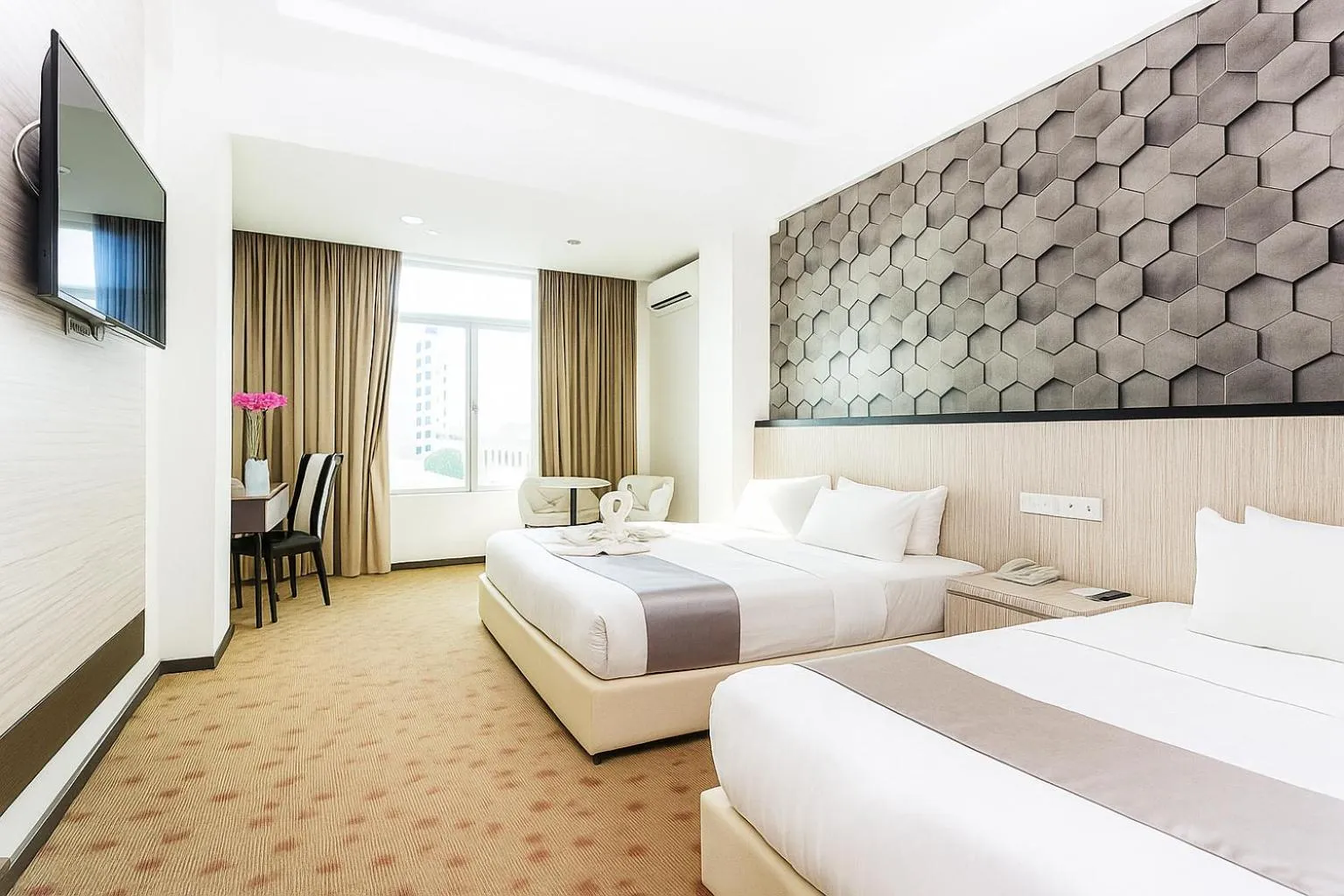 Bed in THE REED HOTEL MELAKA formerly known as E-Red Hotel Melaka