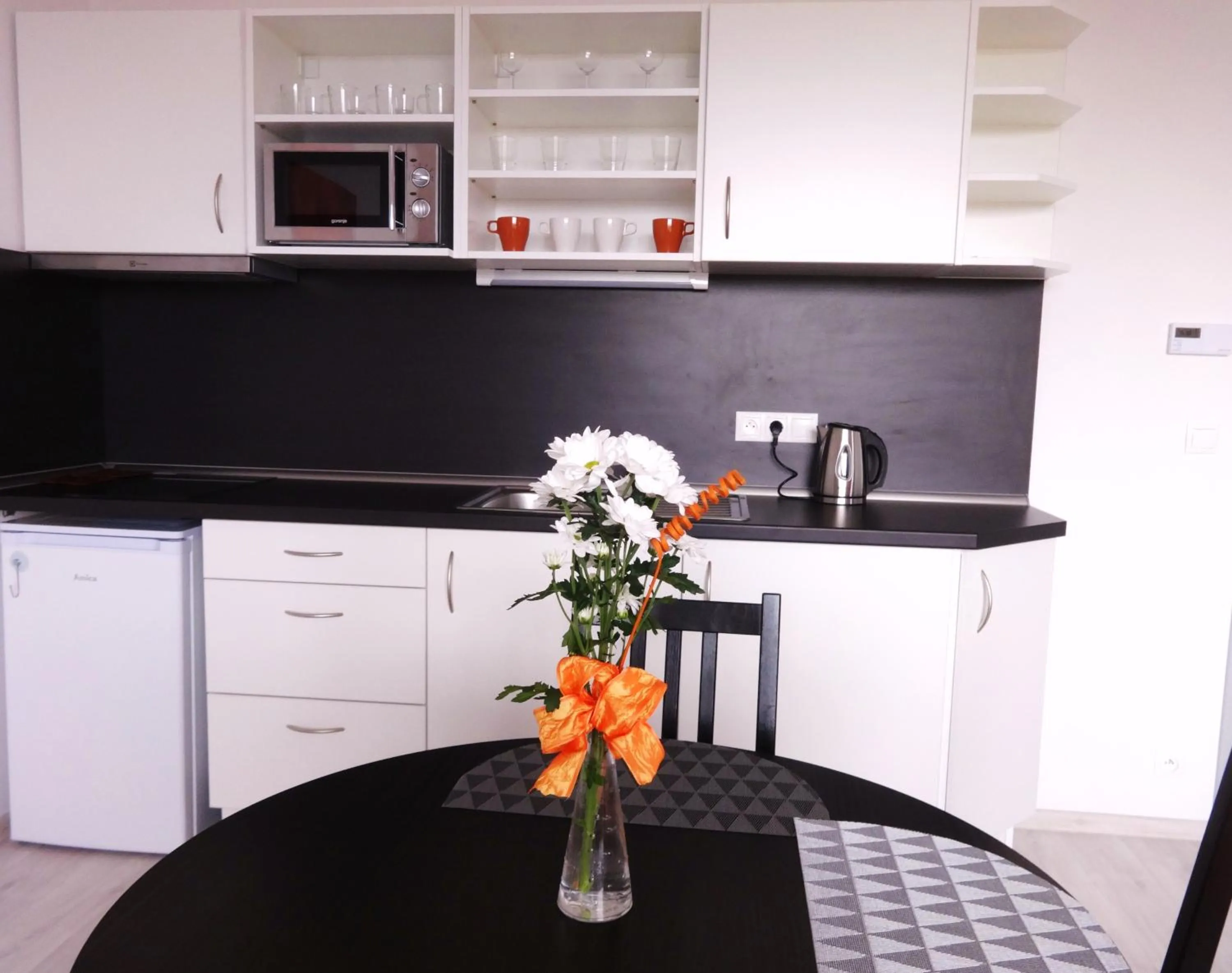 Kitchen or kitchenette in Apartments 4U center + free parking