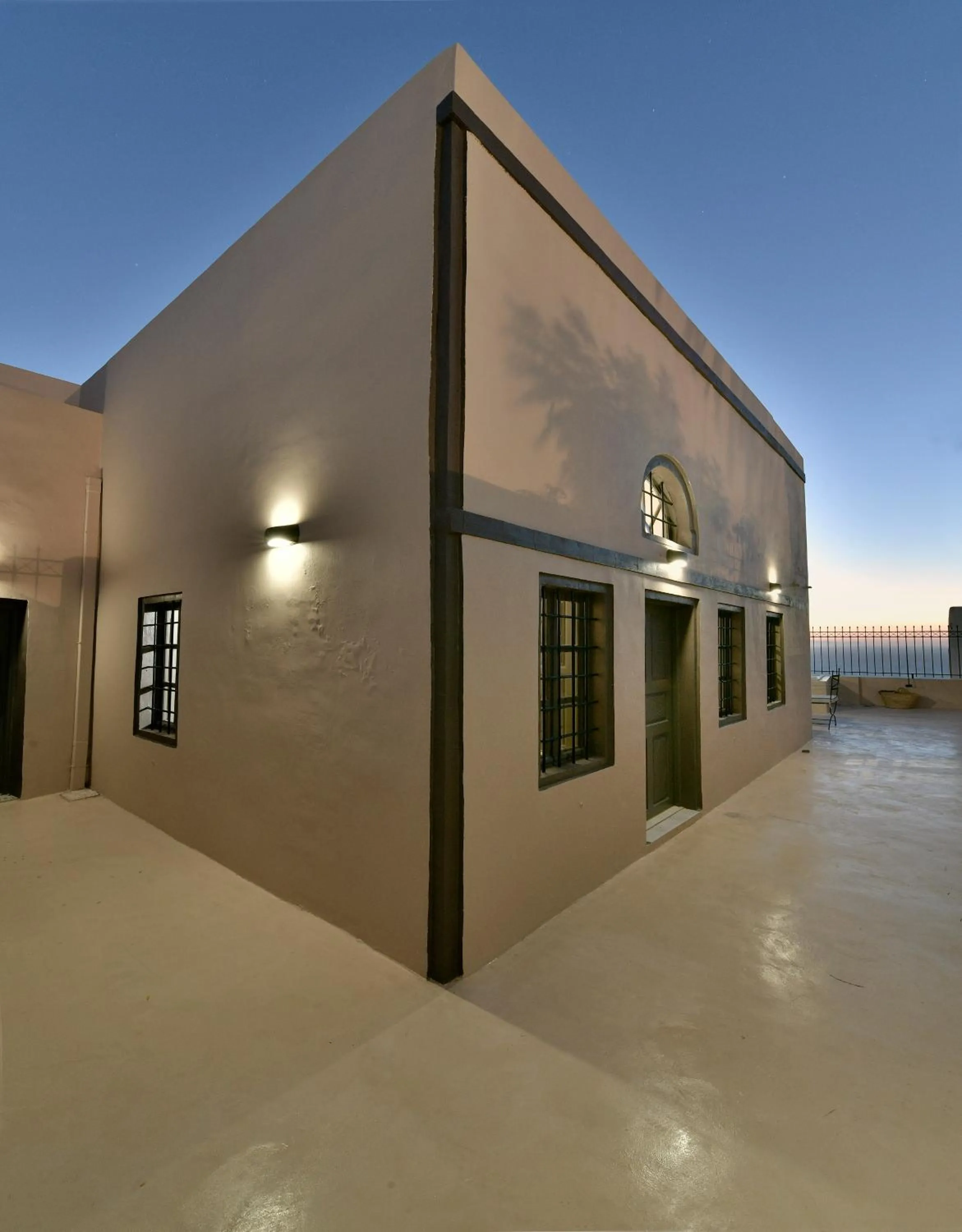Facade/entrance in OIA UNIQUE HOMES by K&K