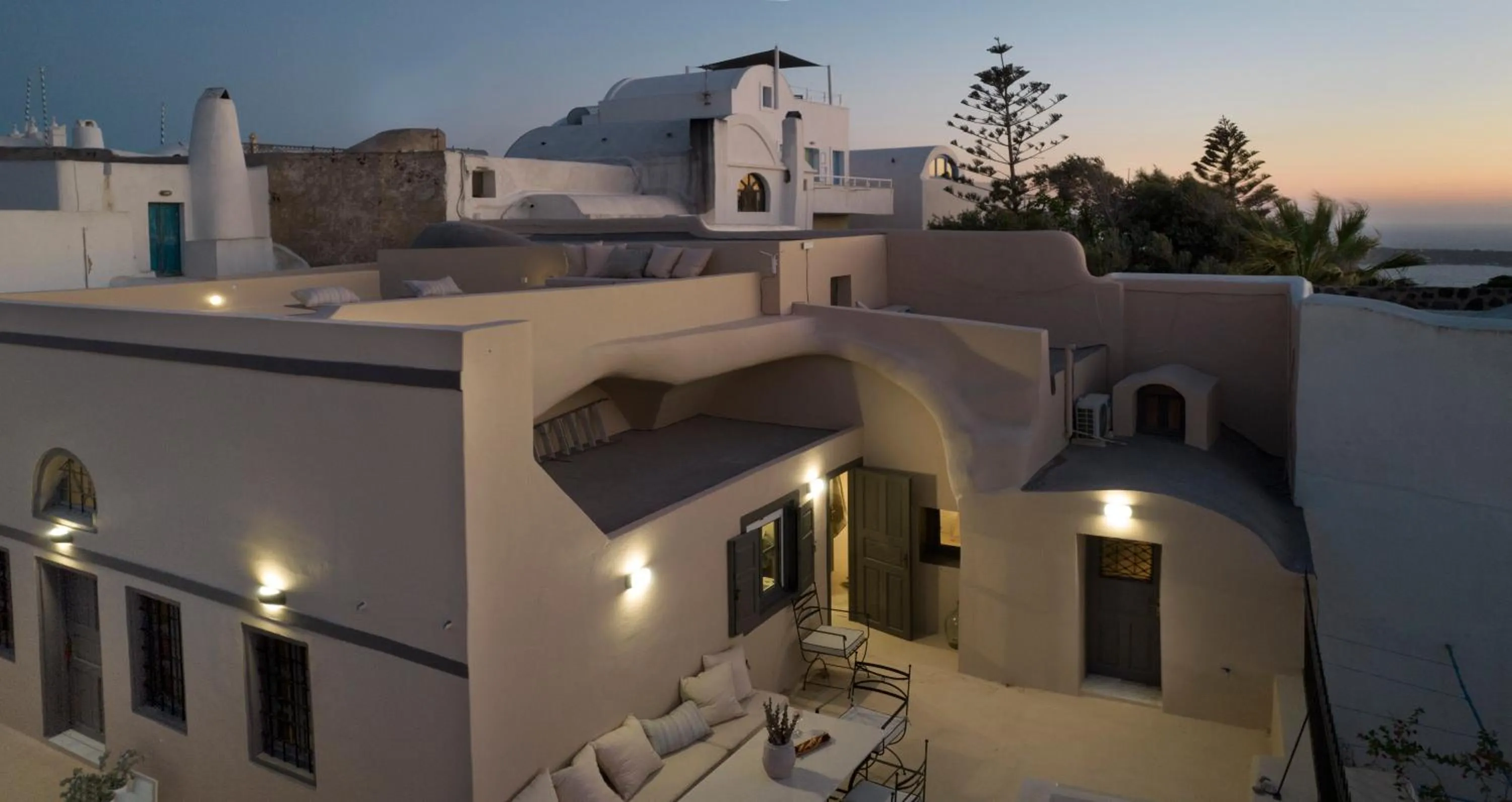 Facade/entrance in OIA UNIQUE HOMES by K&K