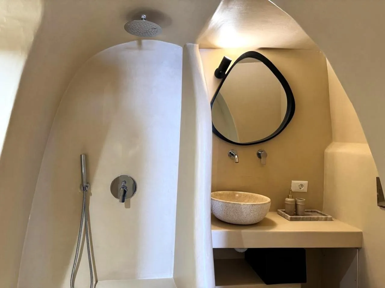 Shower in OIA UNIQUE HOMES by K&K