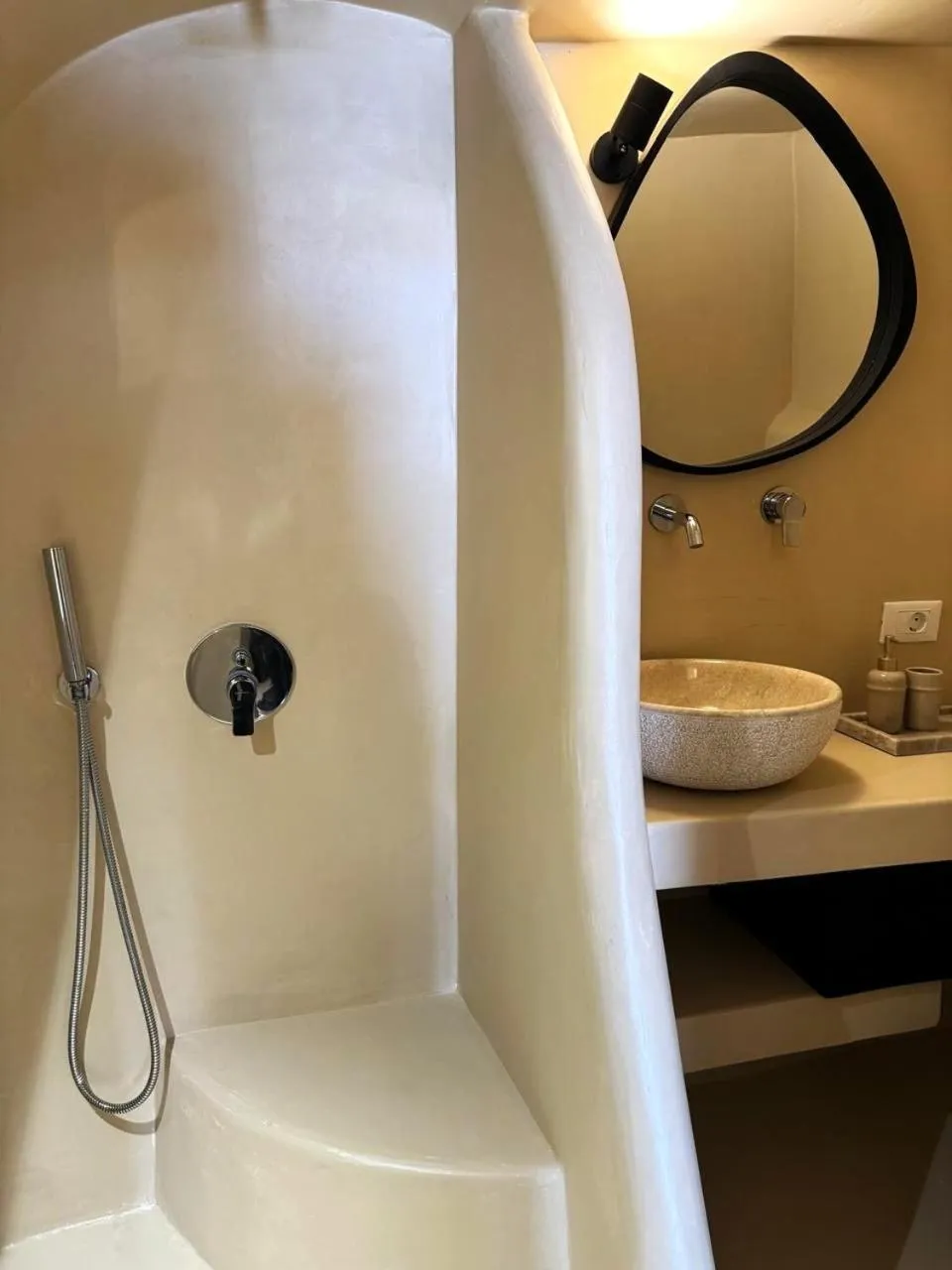 Shower in OIA UNIQUE HOMES by K&K