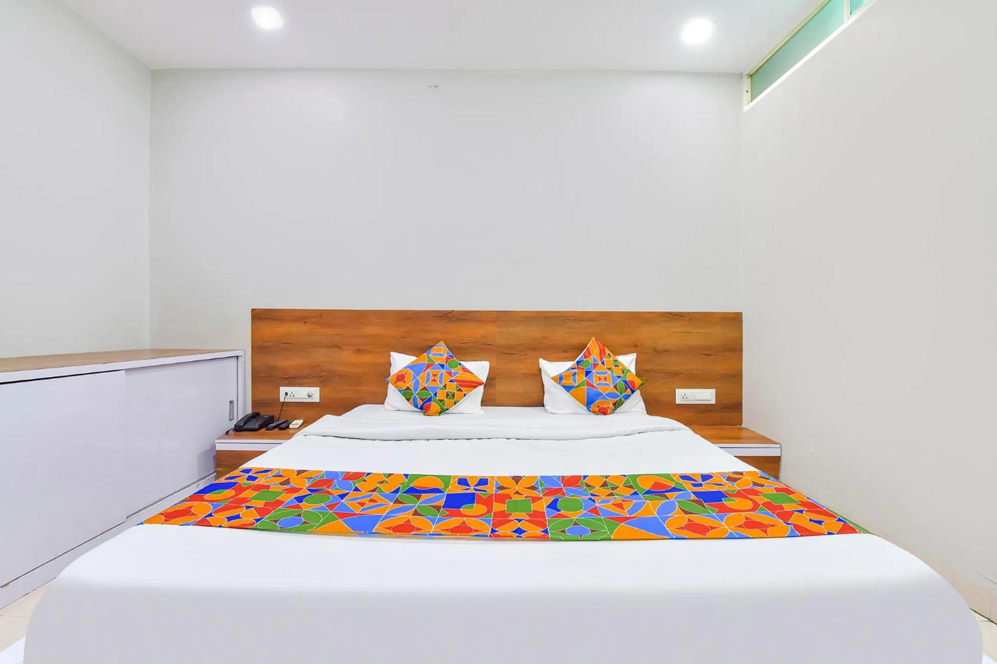 Bed in FabHotel Raghumani Palace - Nr Mahakal Mandir