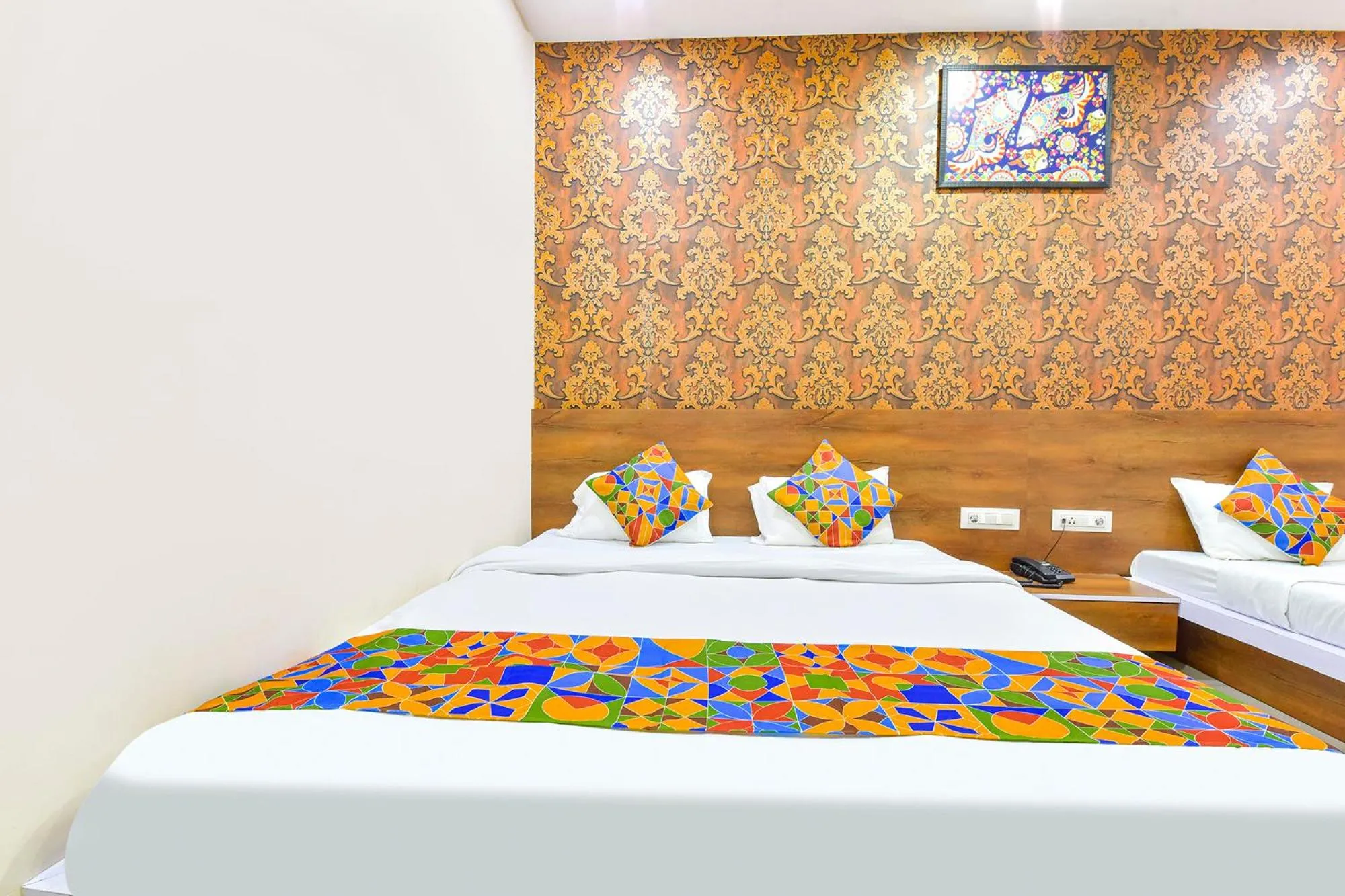 Bed in FabHotel Raghumani Palace - Nr Mahakal Mandir