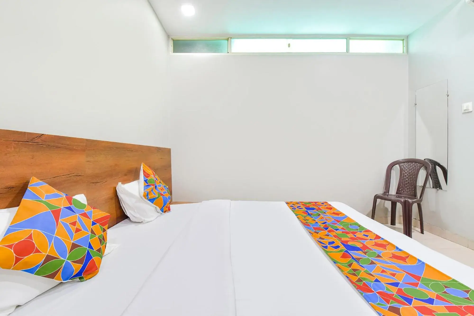 Bed in FabHotel Raghumani Palace - Nr Mahakal Mandir Bed in FabHotel Raghumani Palace - Nr Mahakal Mandir