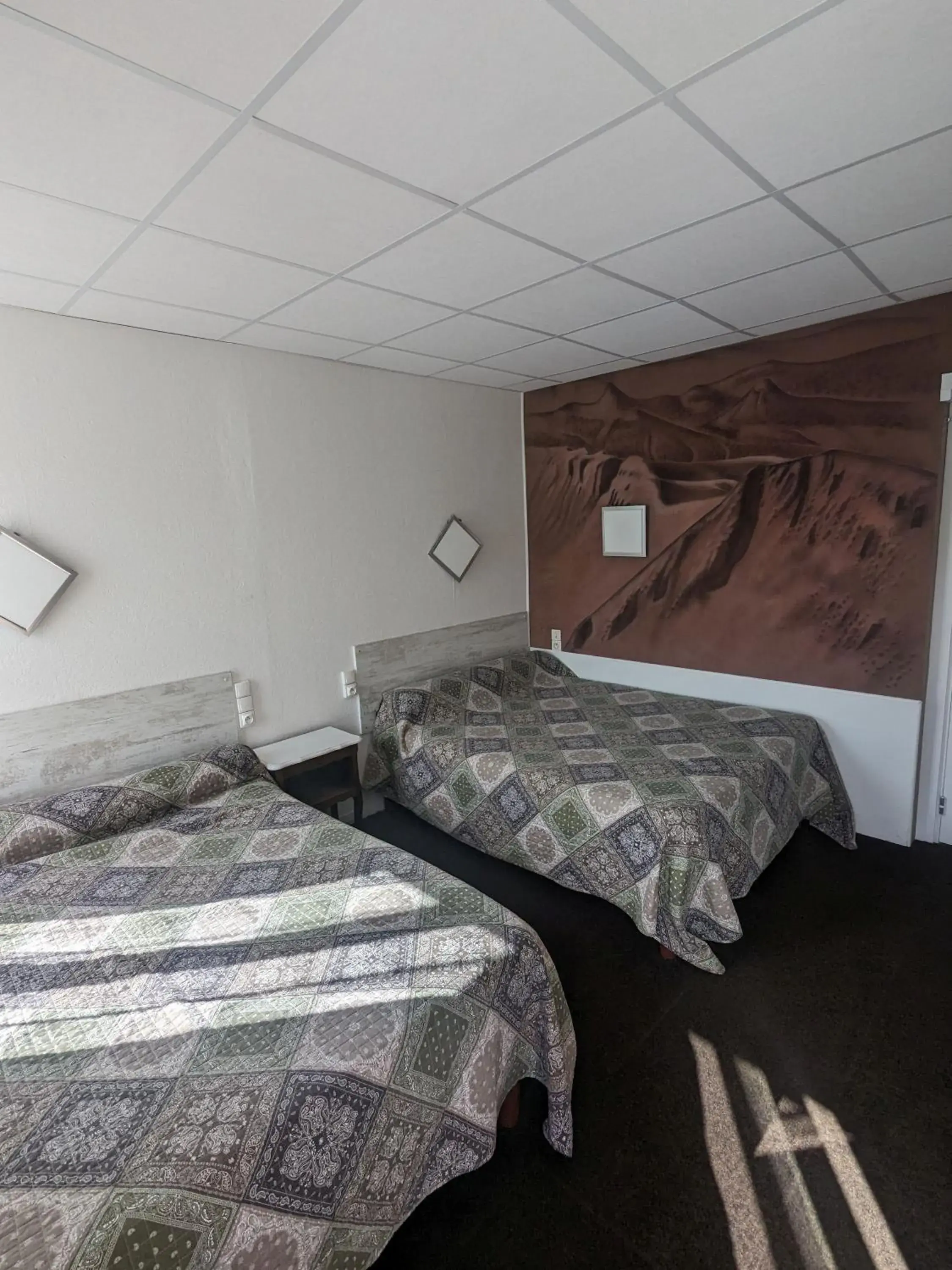 Bedroom, Bed in Hôtel Le Rider Bedroom, Bed in Hôtel Le Rider