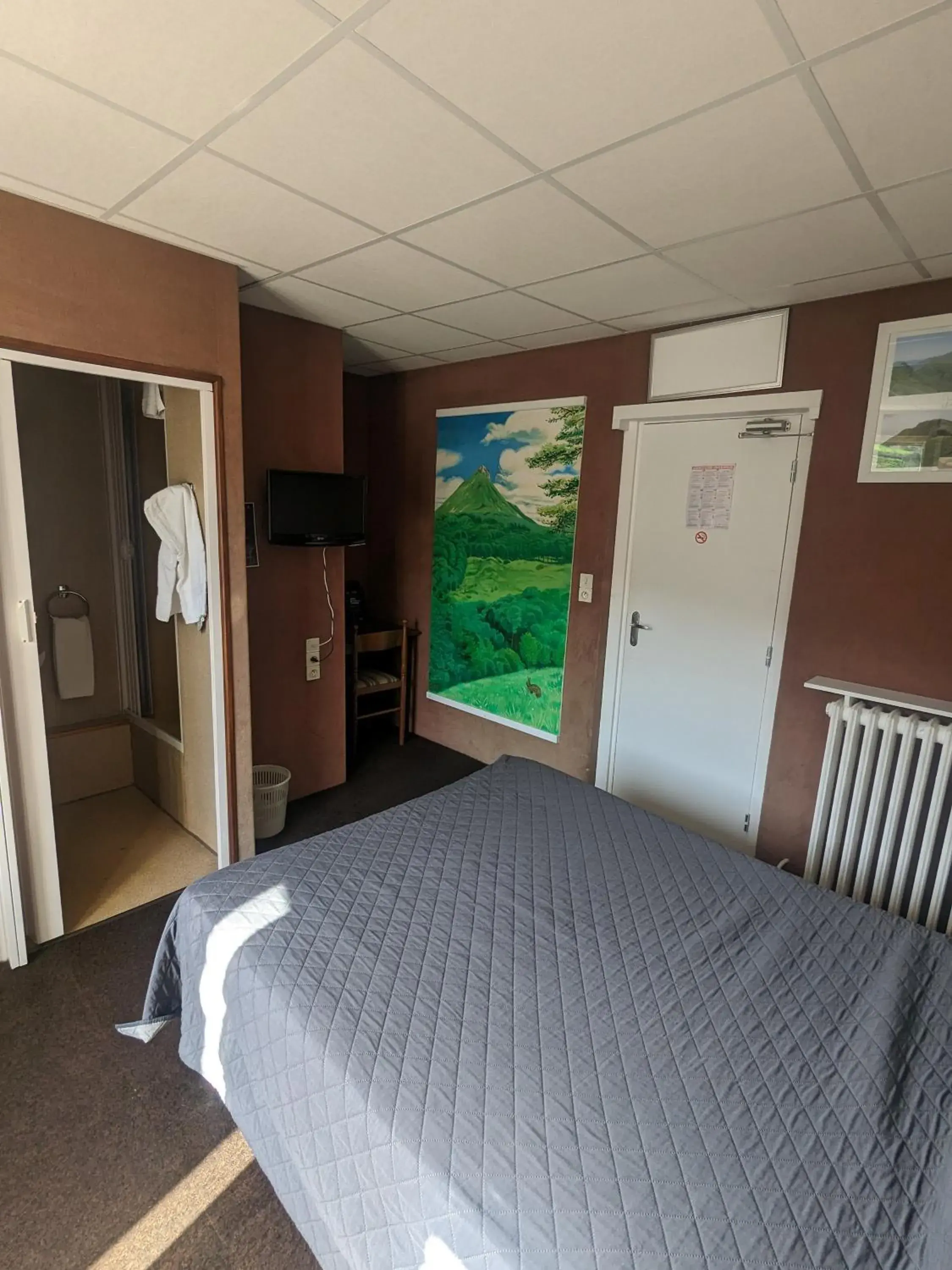 Bedroom, Bed in Hôtel Le Rider Bedroom, Bed in Hôtel Le Rider