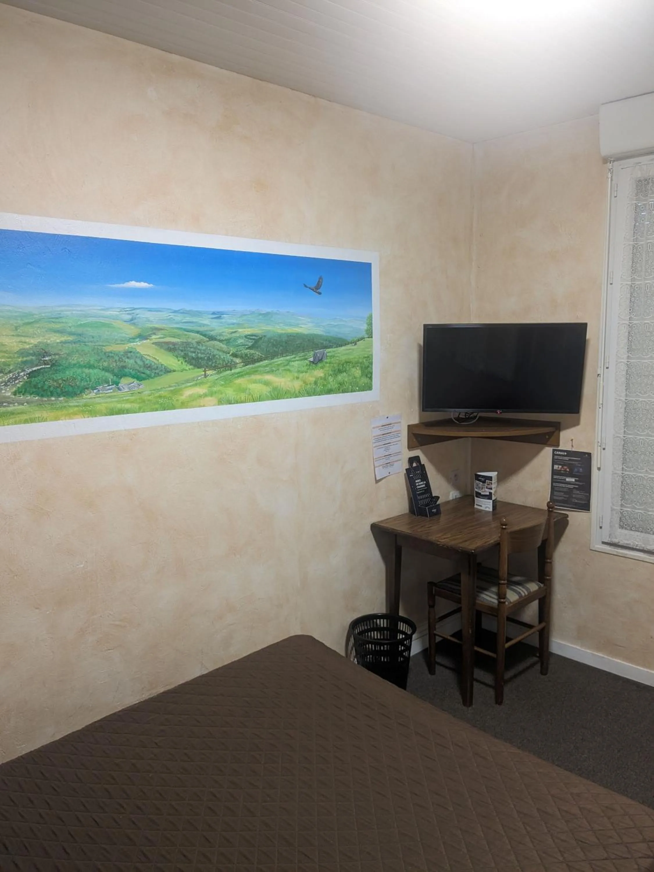 Bedroom in Hôtel Le Rider