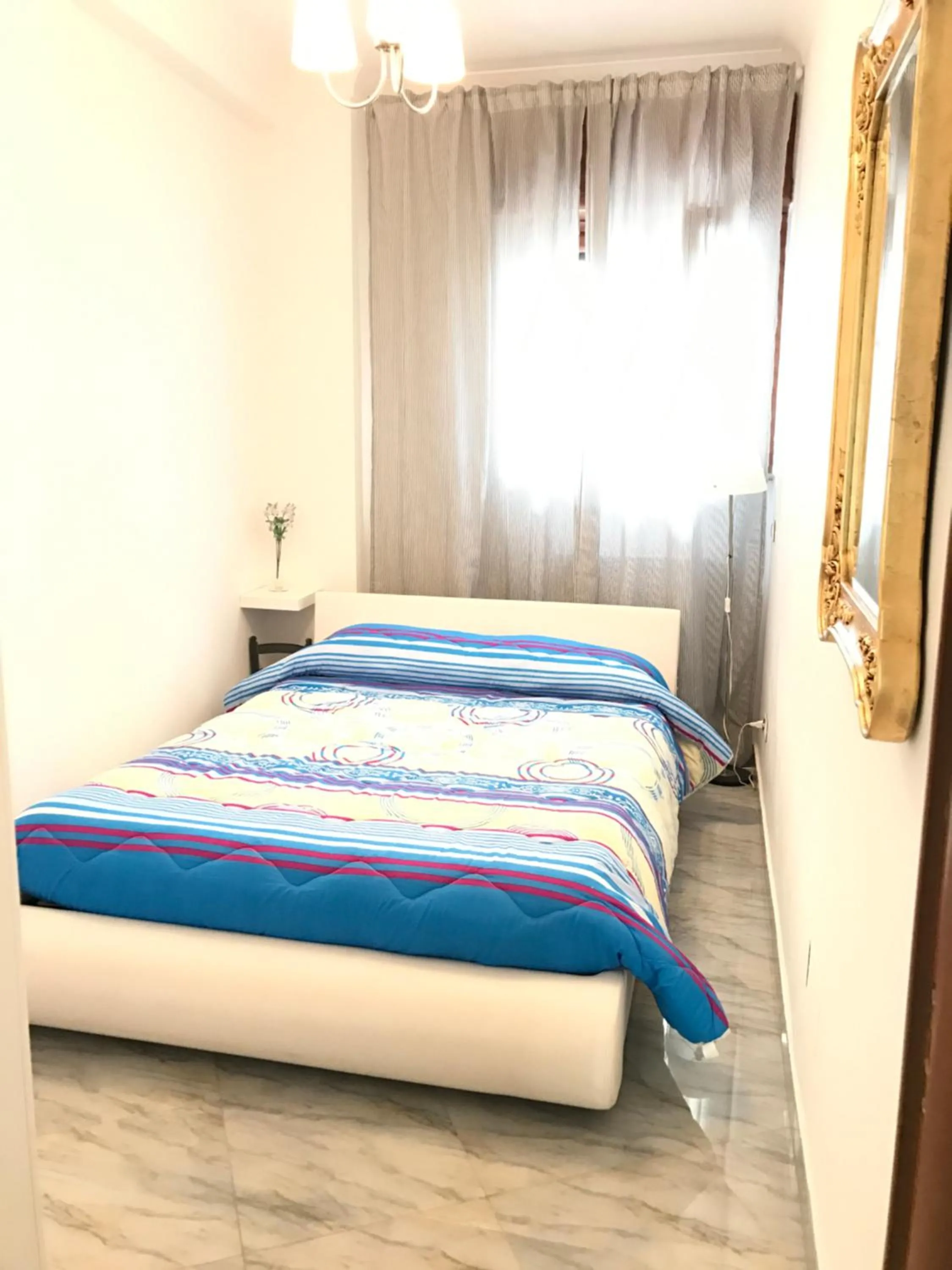 Bed in Supera Napoli Apartment