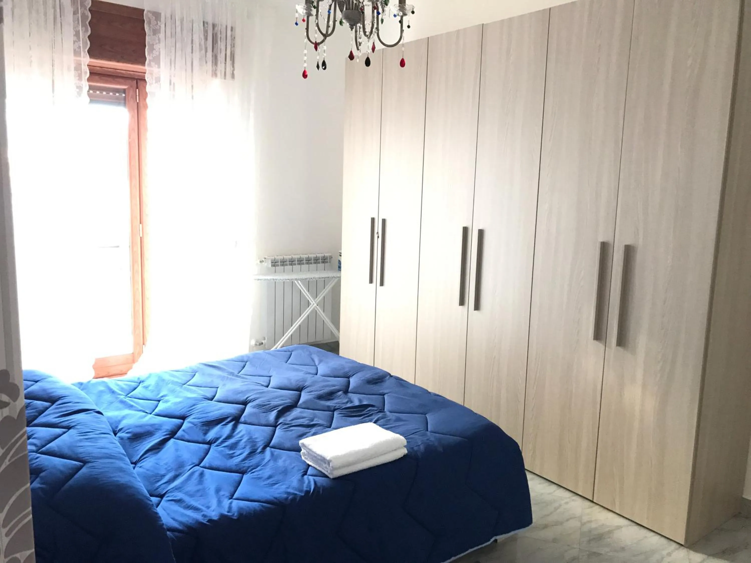 Bedroom, Bed in Supera Napoli Apartment