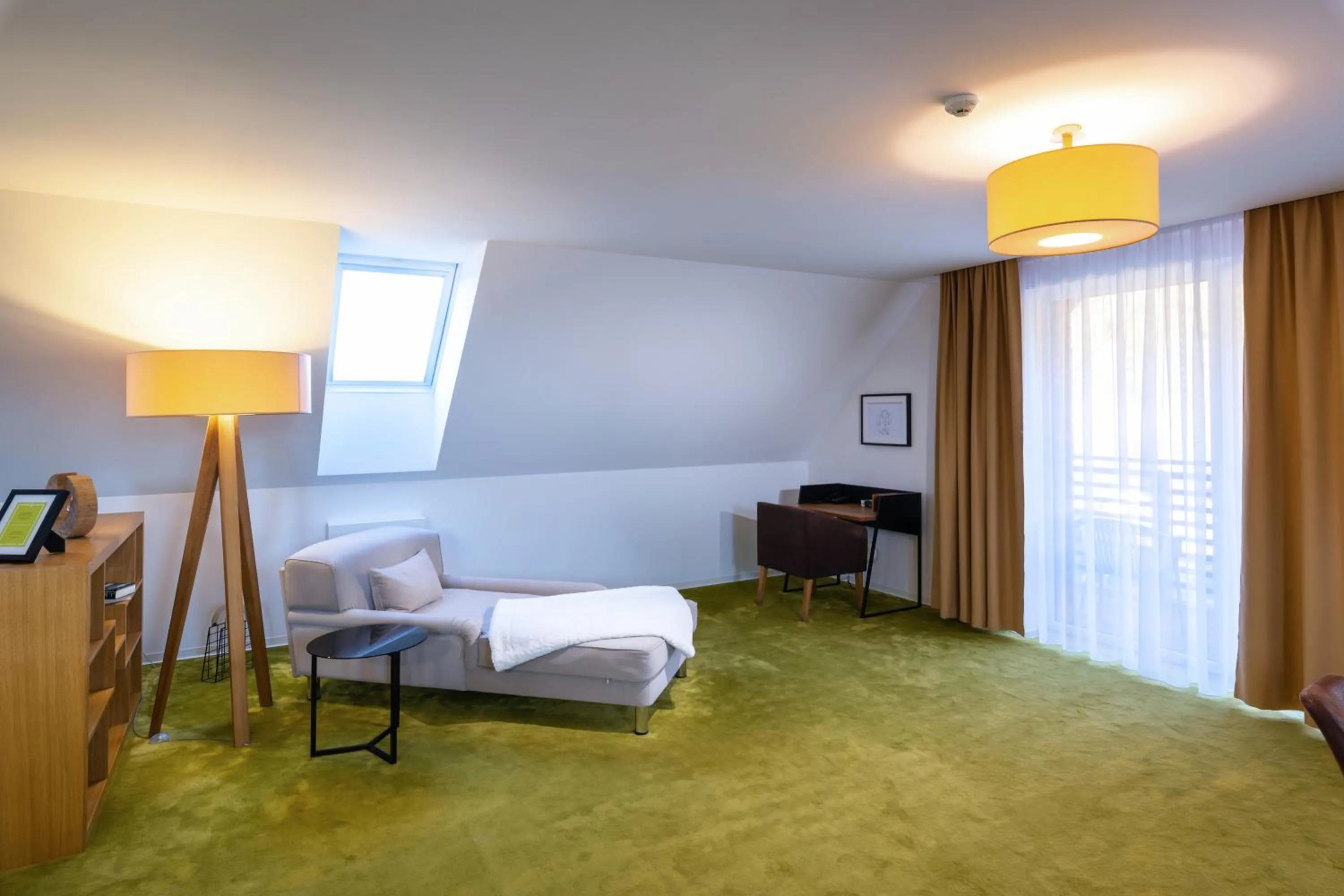 Seating area, Bed in Village Resort Hanuliak